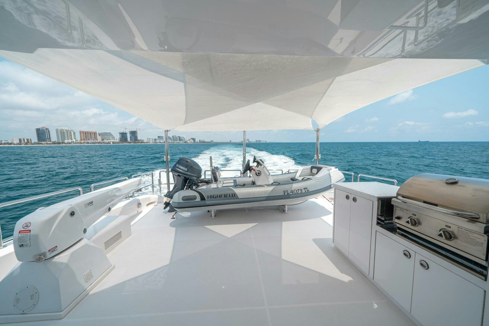 a boat on the water aboard AFTER MIDNIGHT Yacht for Sale