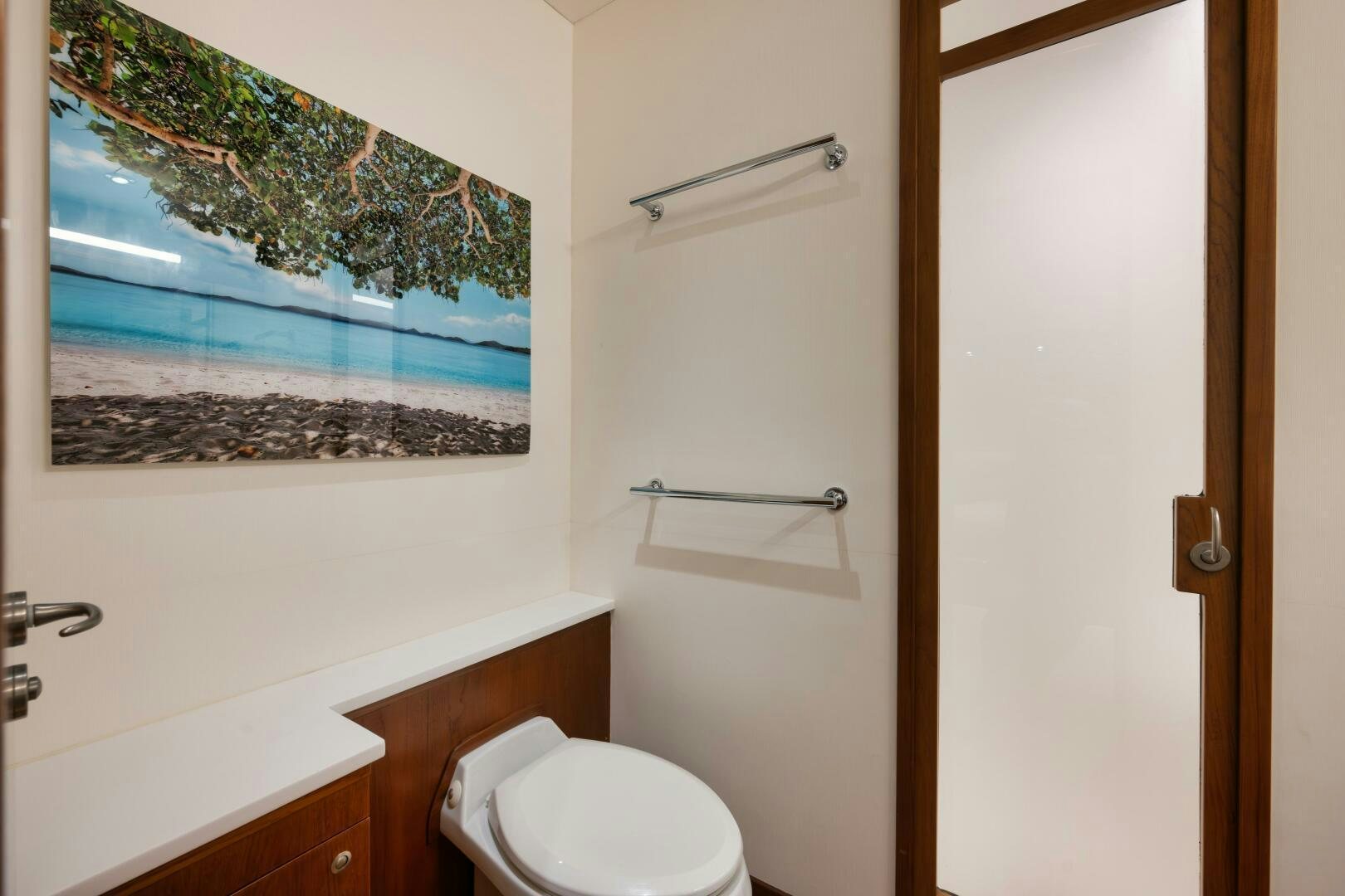 a bathroom with a toilet and a sink aboard BOXER Yacht for Sale