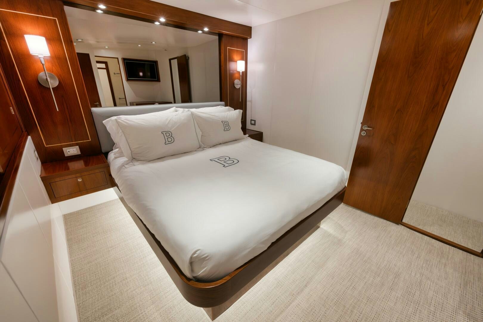 a bed in a hotel room aboard BOXER Yacht for Sale