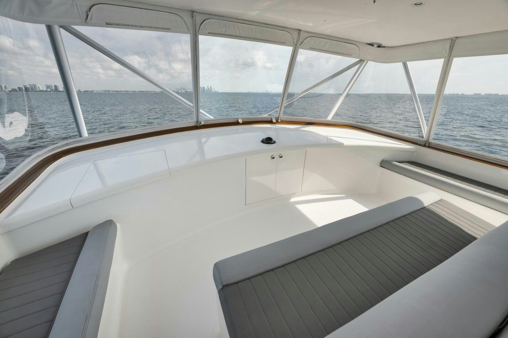 a large white boat with a large window aboard BOXER Yacht for Sale
