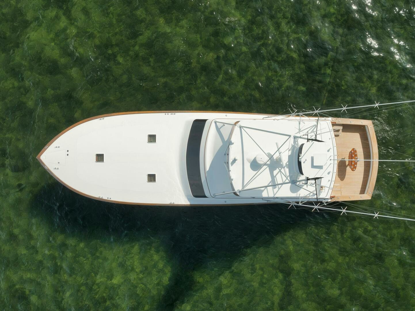 a basketball hoop with trees in the background aboard BOXER Yacht for Sale