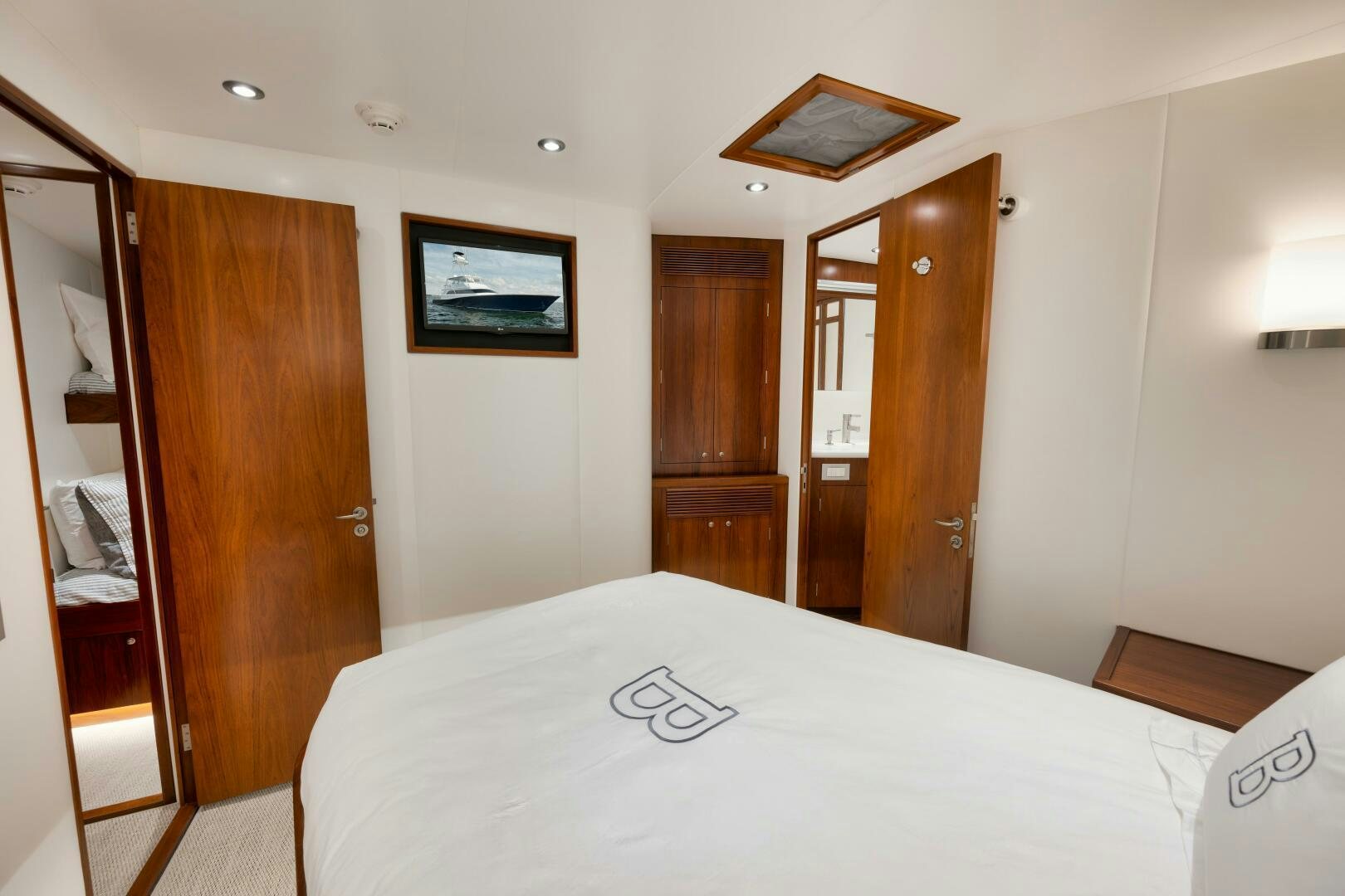 a hotel room with a bed aboard BOXER Yacht for Sale