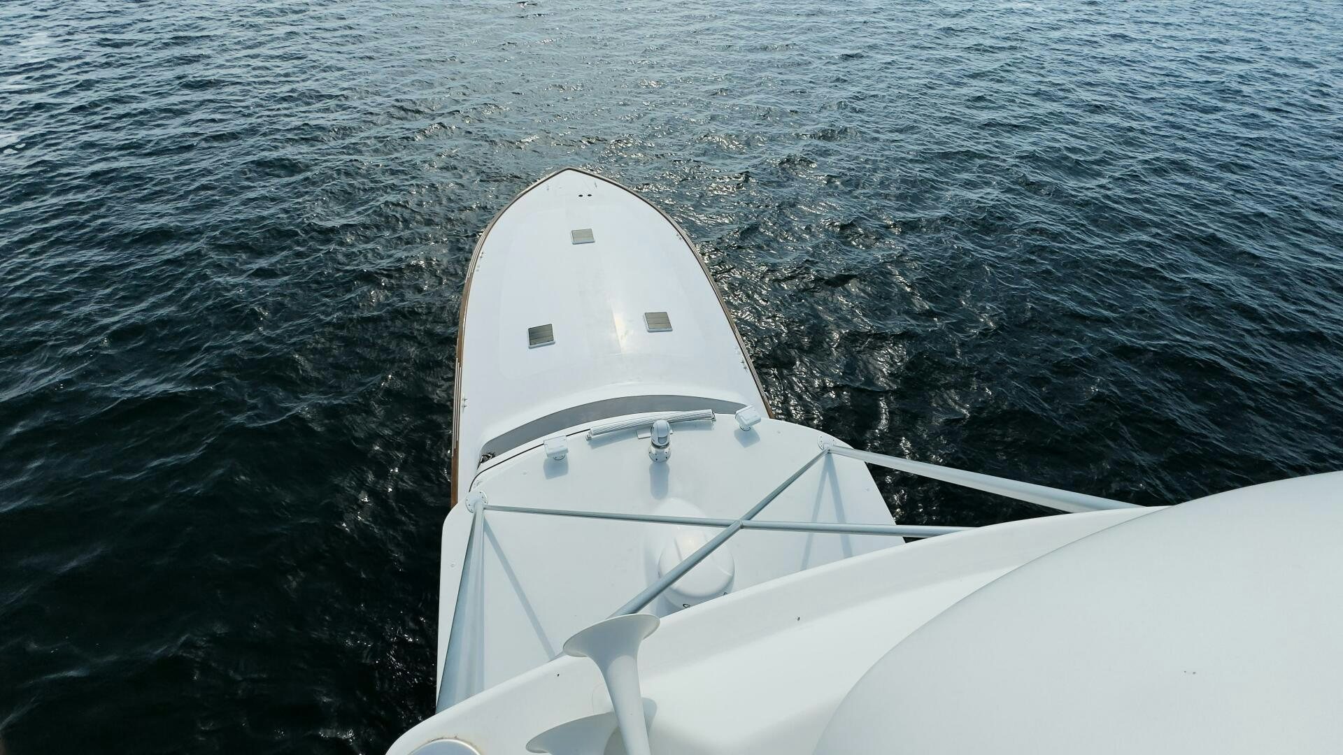 a white boat in the water aboard BOXER Yacht for Sale
