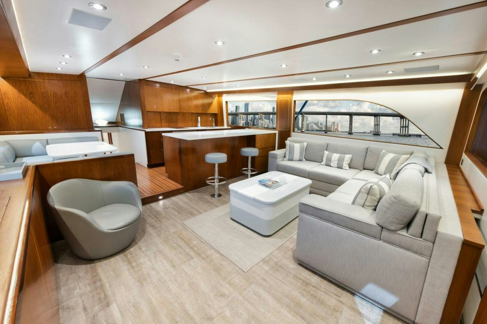 a living room with a couch and a table aboard BOXER Yacht for Sale
