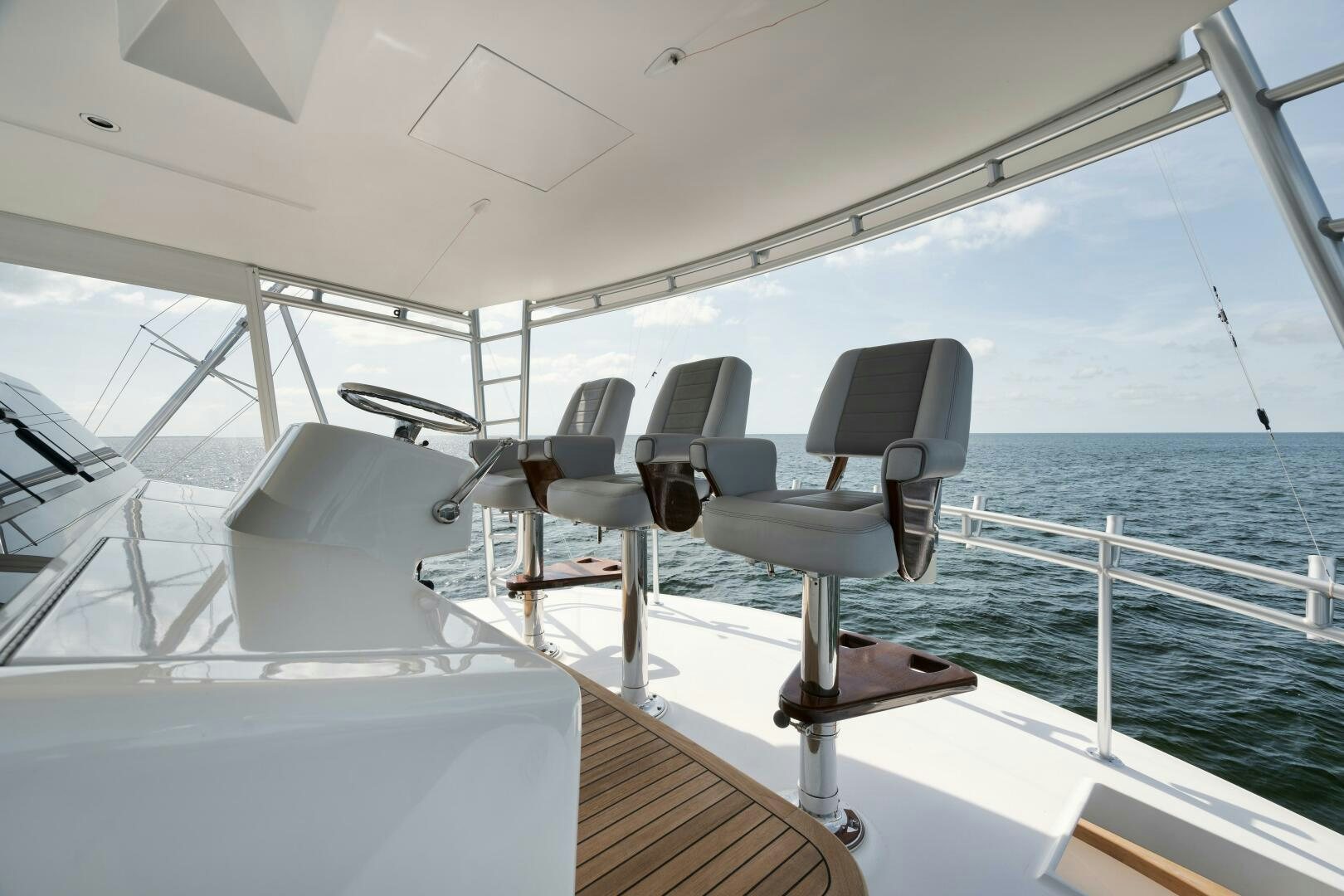 a boat with chairs on the deck aboard BOXER Yacht for Sale
