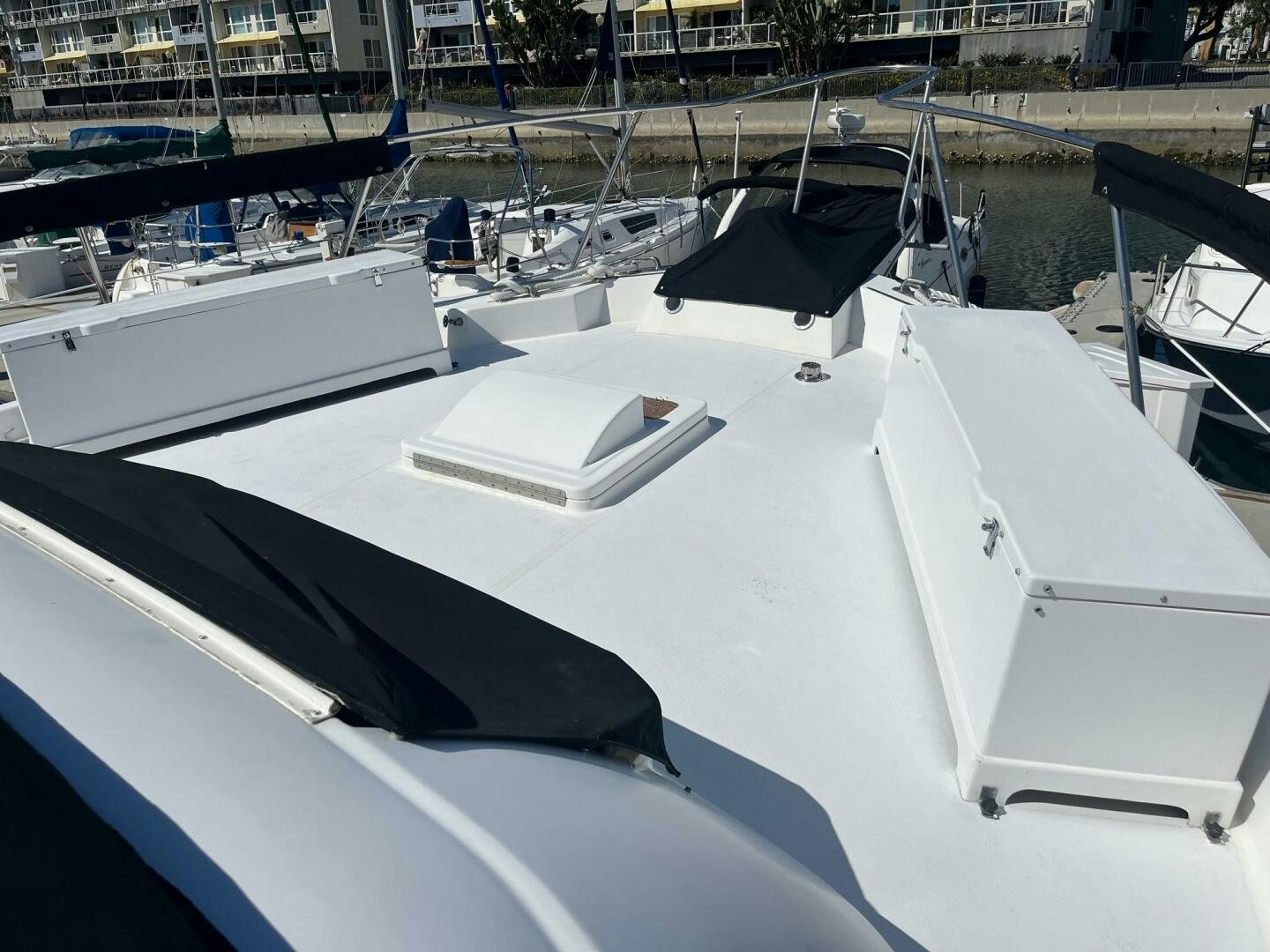 a group of boats are parked in a harbor aboard LADY T Yacht for Sale
