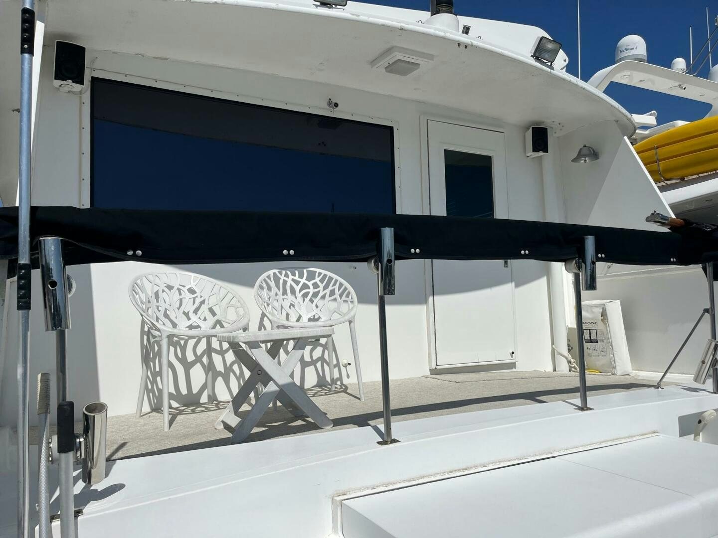 a white boat with a black frame aboard LADY T Yacht for Sale