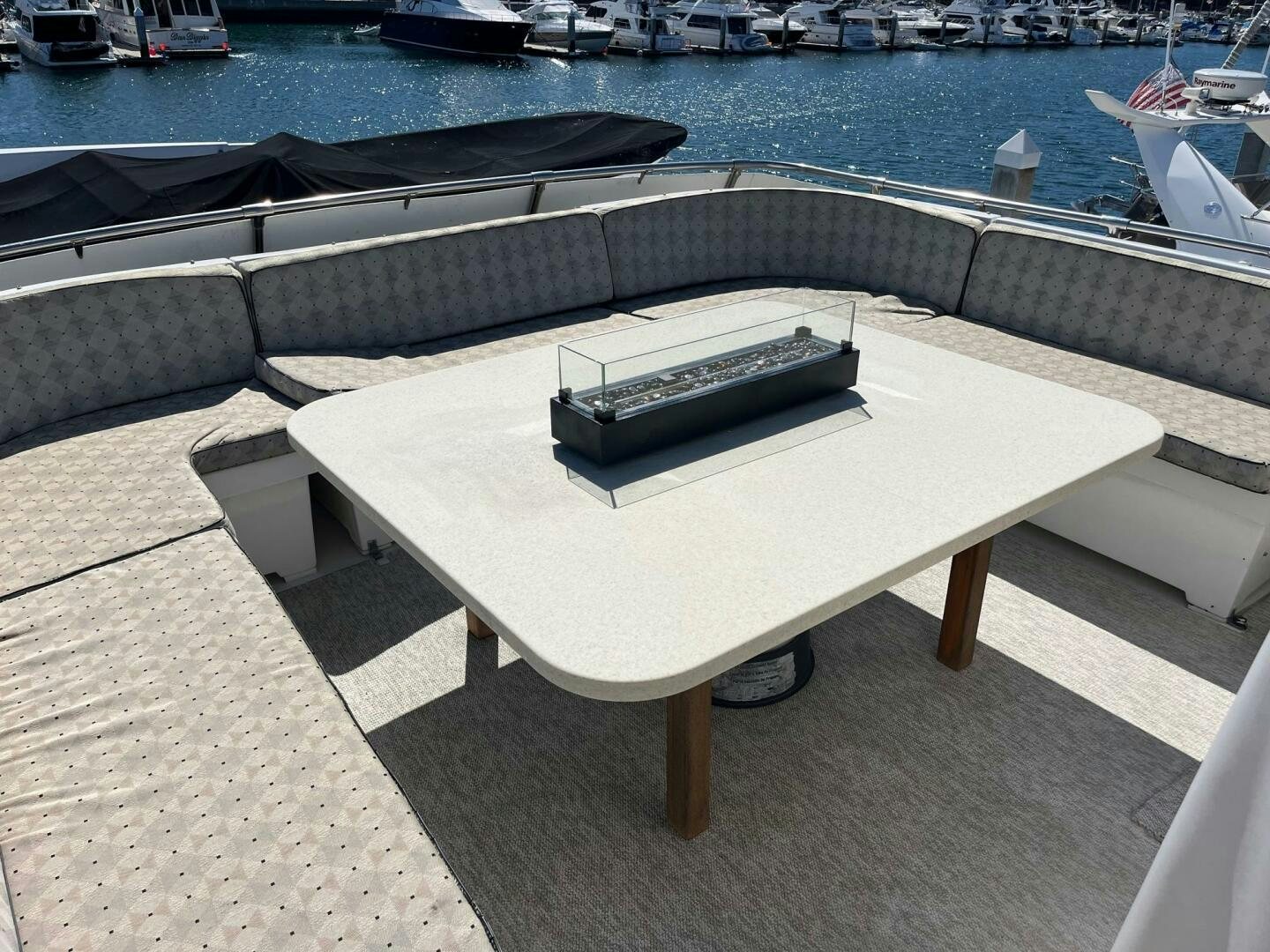 a table with a laptop on it aboard LADY T Yacht for Sale
