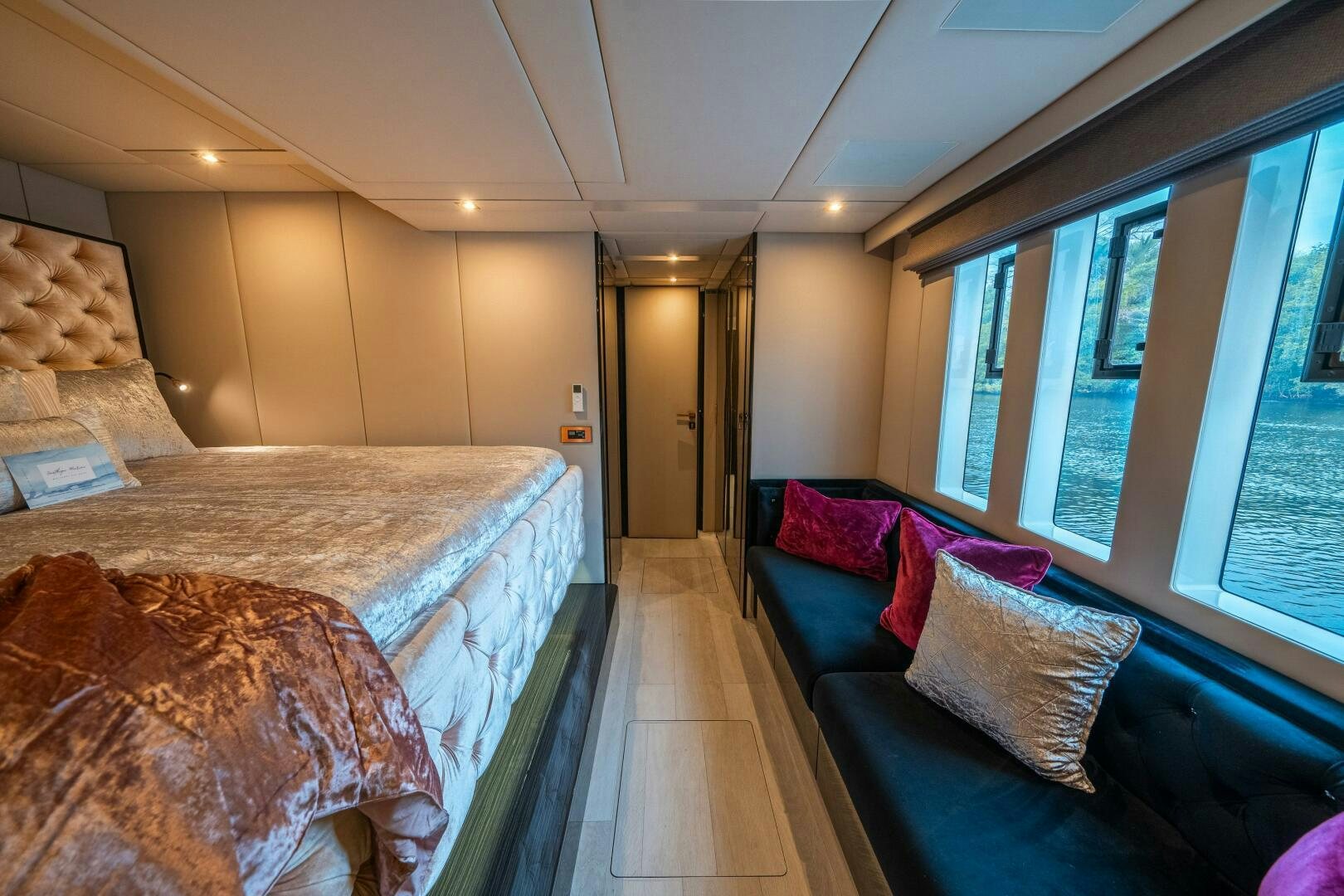 a bedroom with a bed and a couch aboard SECOND CHANCE Yacht for Sale