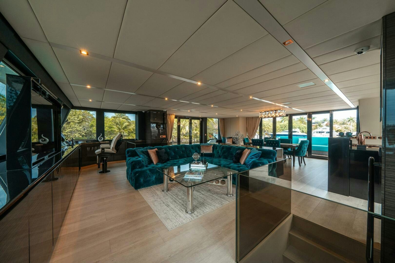 a large living room with a large screen aboard SECOND CHANCE Yacht for Sale