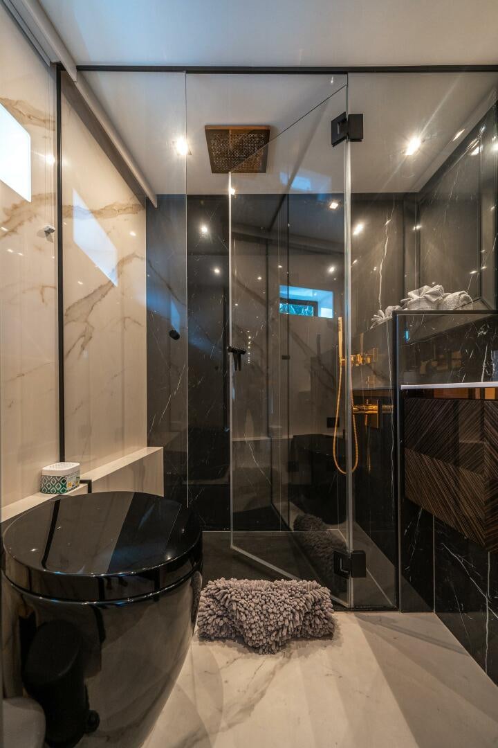 a bathroom with a glass shower aboard SECOND CHANCE Yacht for Sale