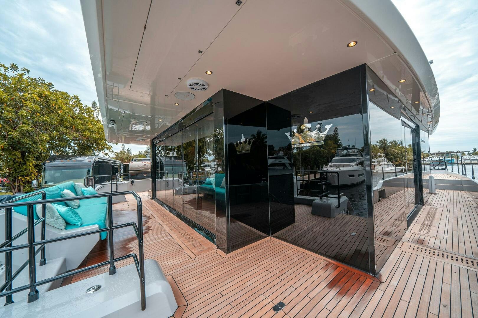 a deck with a pool and a deck with a view of the water aboard SECOND CHANCE Yacht for Sale