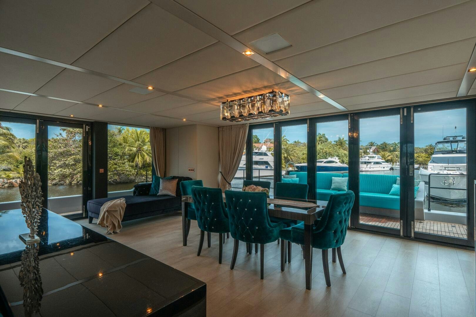 a large living room with a large glass window aboard SECOND CHANCE Yacht for Sale