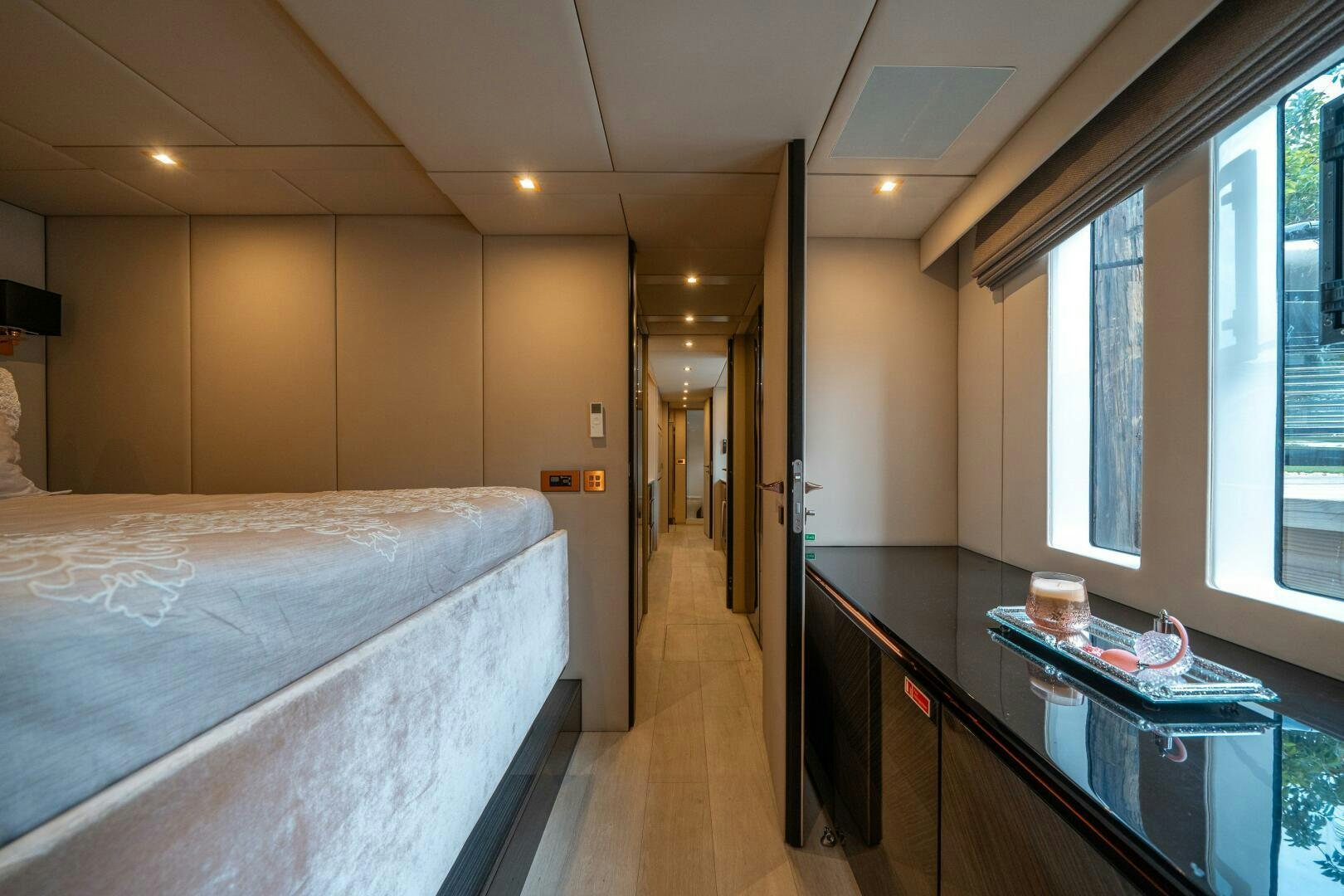 a hotel room with a bed and a table aboard SECOND CHANCE Yacht for Sale