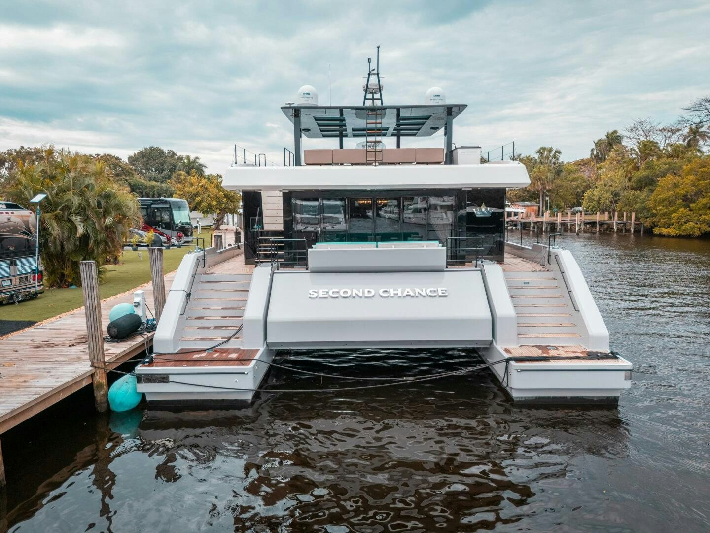 a boat docked at a pier aboard SECOND CHANCE Yacht for Sale
