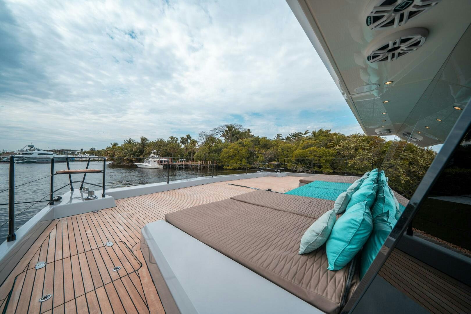 a deck with a view of a lake and a boat aboard SECOND CHANCE Yacht for Sale