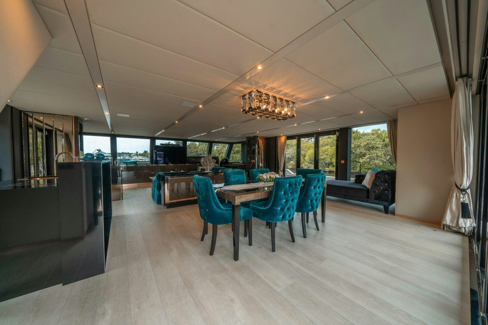 a room with a wood floor and a wood floor and a large window aboard SECOND CHANCE Yacht for Sale