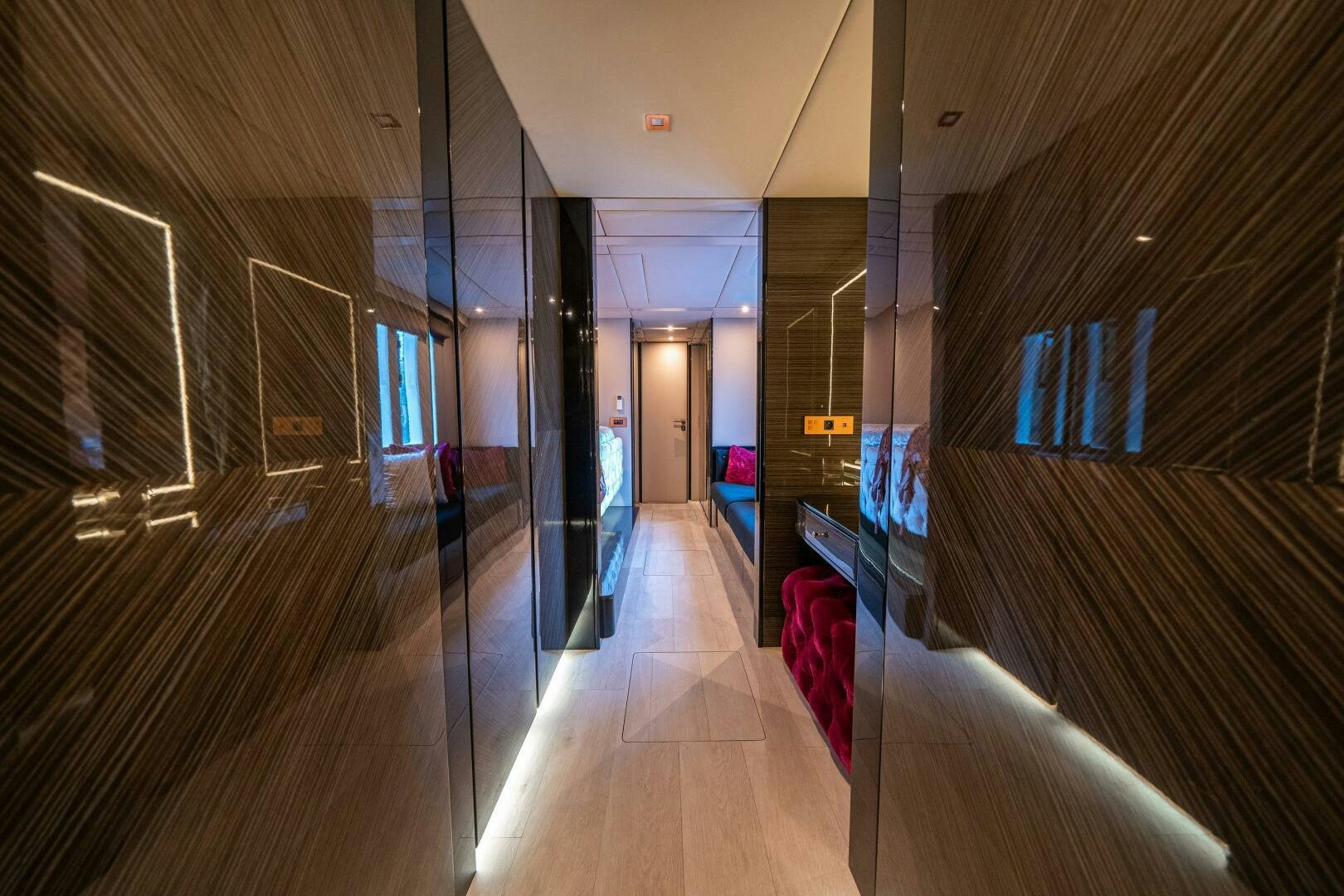 a hallway with glass doors aboard SECOND CHANCE Yacht for Sale
