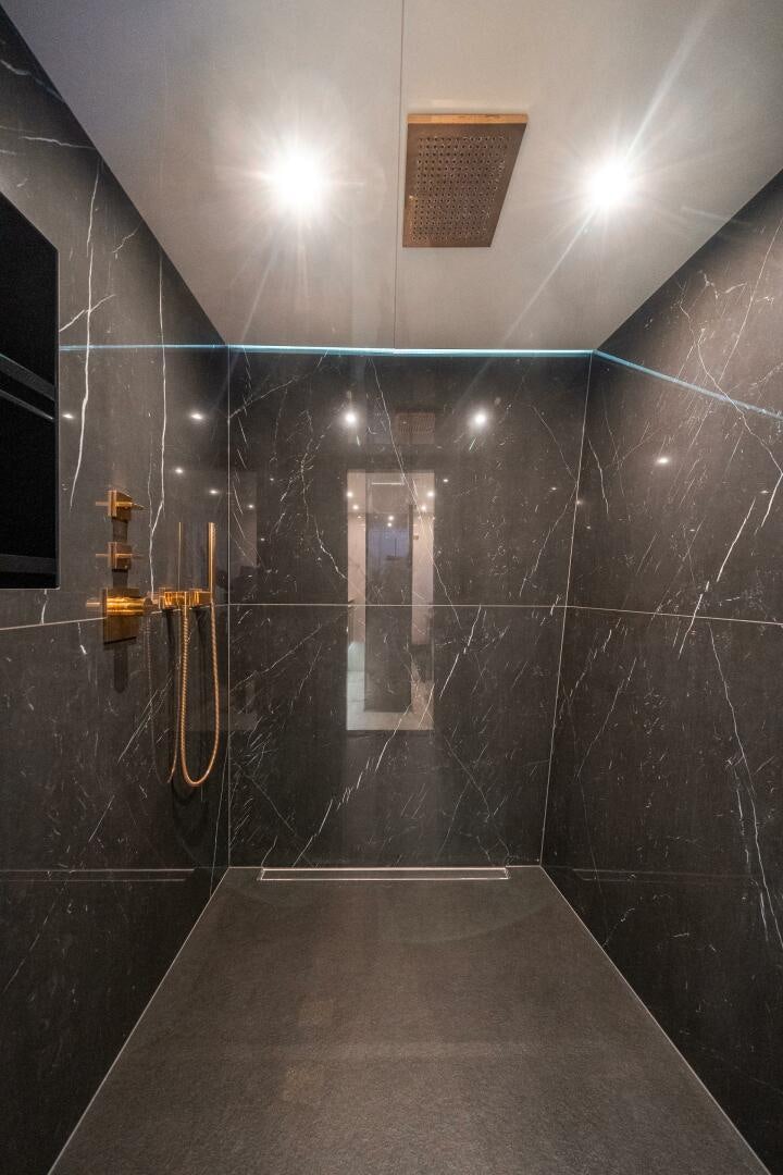 a bathroom with a shower and a sink aboard SECOND CHANCE Yacht for Sale