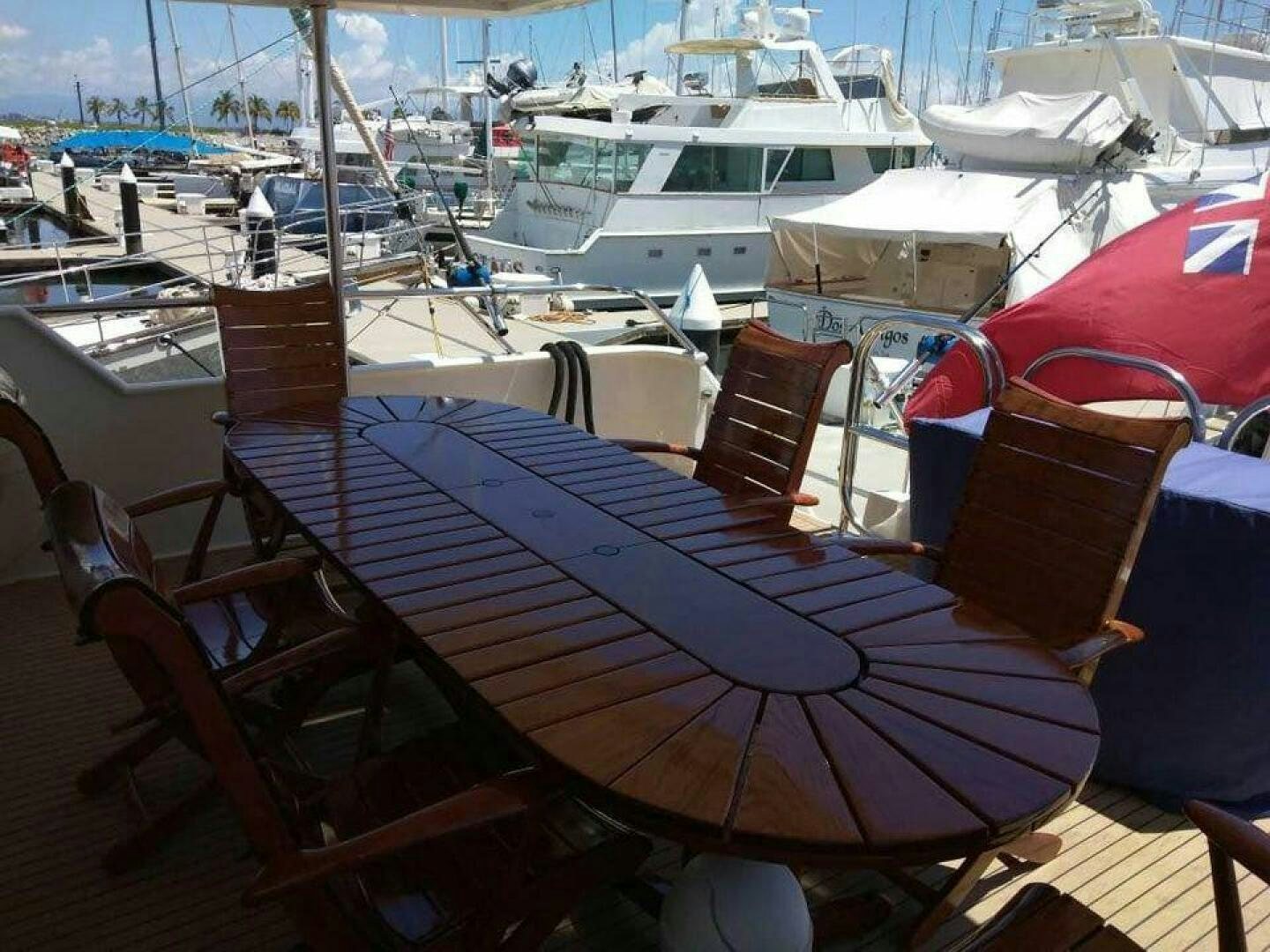 a group of boats sit on a dock aboard THE BEST DAY Yacht for Sale