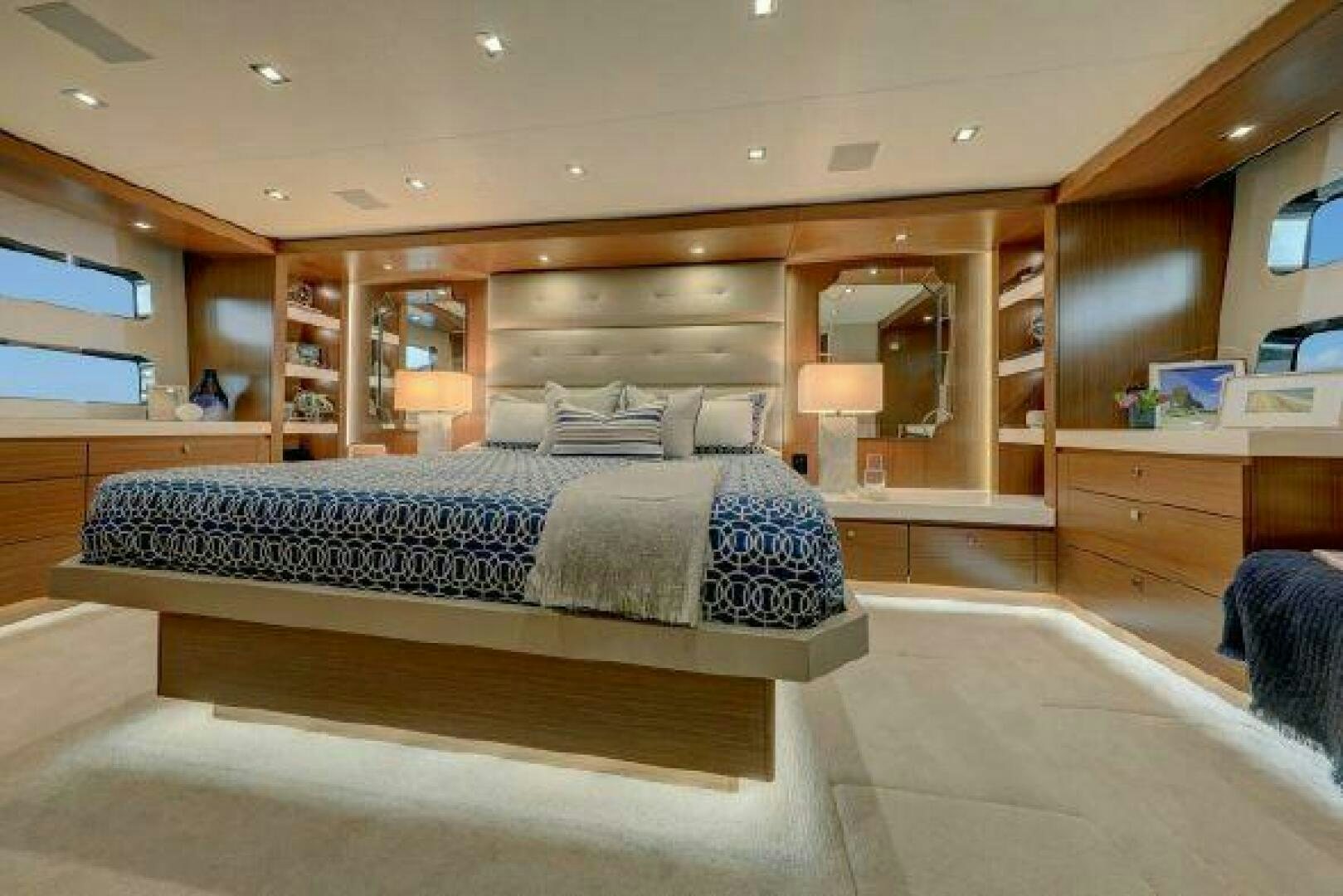 a large bedroom with a large bed aboard 75 HATTERAS M75 / 2020 Yacht for Sale