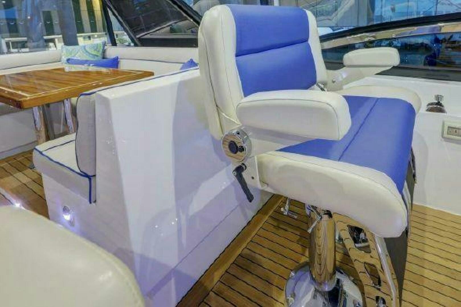 a car with a seat aboard 75 HATTERAS M75 / 2020 Yacht for Sale