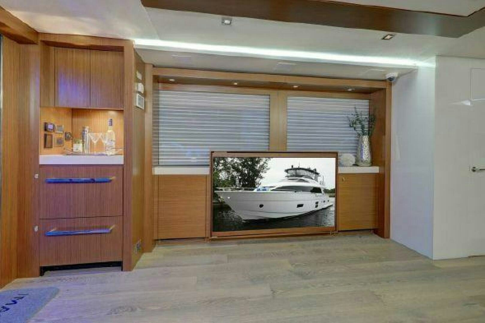 a fireplace in a kitchen aboard 75 HATTERAS M75 / 2020 Yacht for Sale