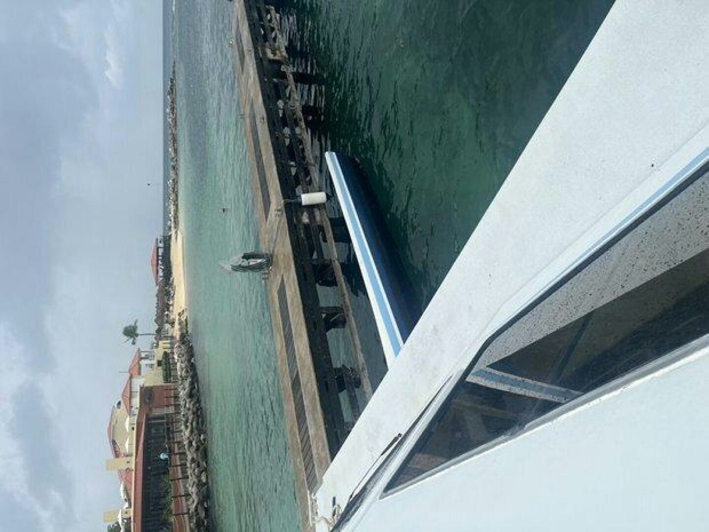 a large building with a tower aboard EDGE 2 Yacht for Sale