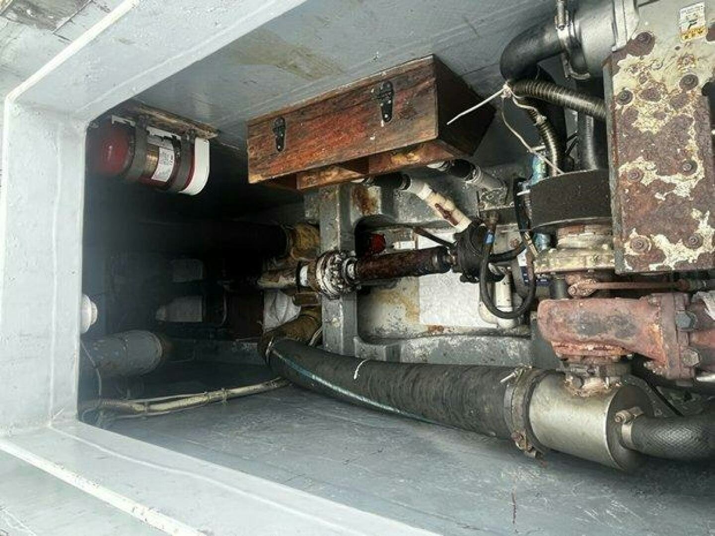 a car with a large engine aboard EDGE 2 Yacht for Sale