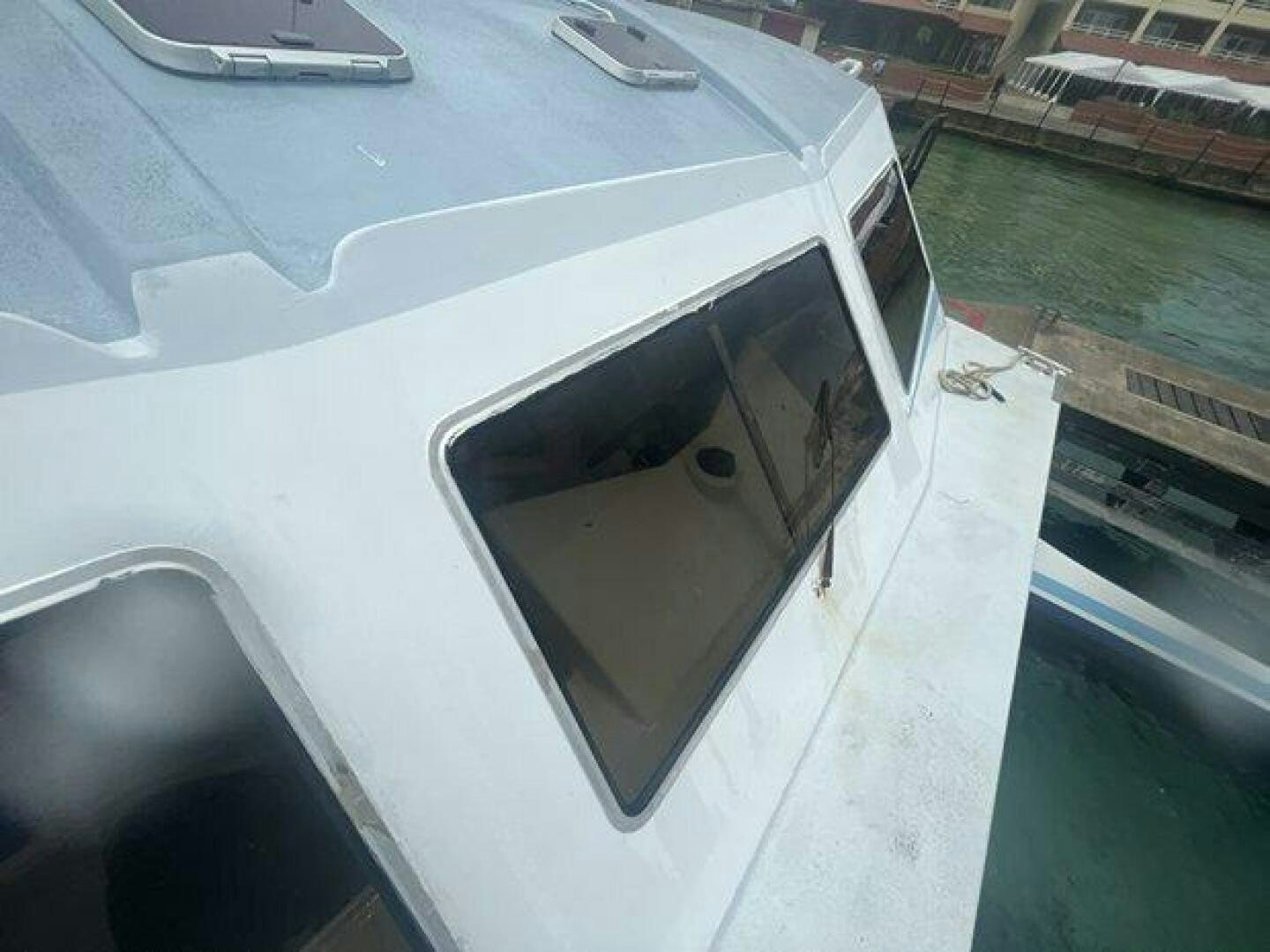 a car on the road aboard EDGE 2 Yacht for Sale