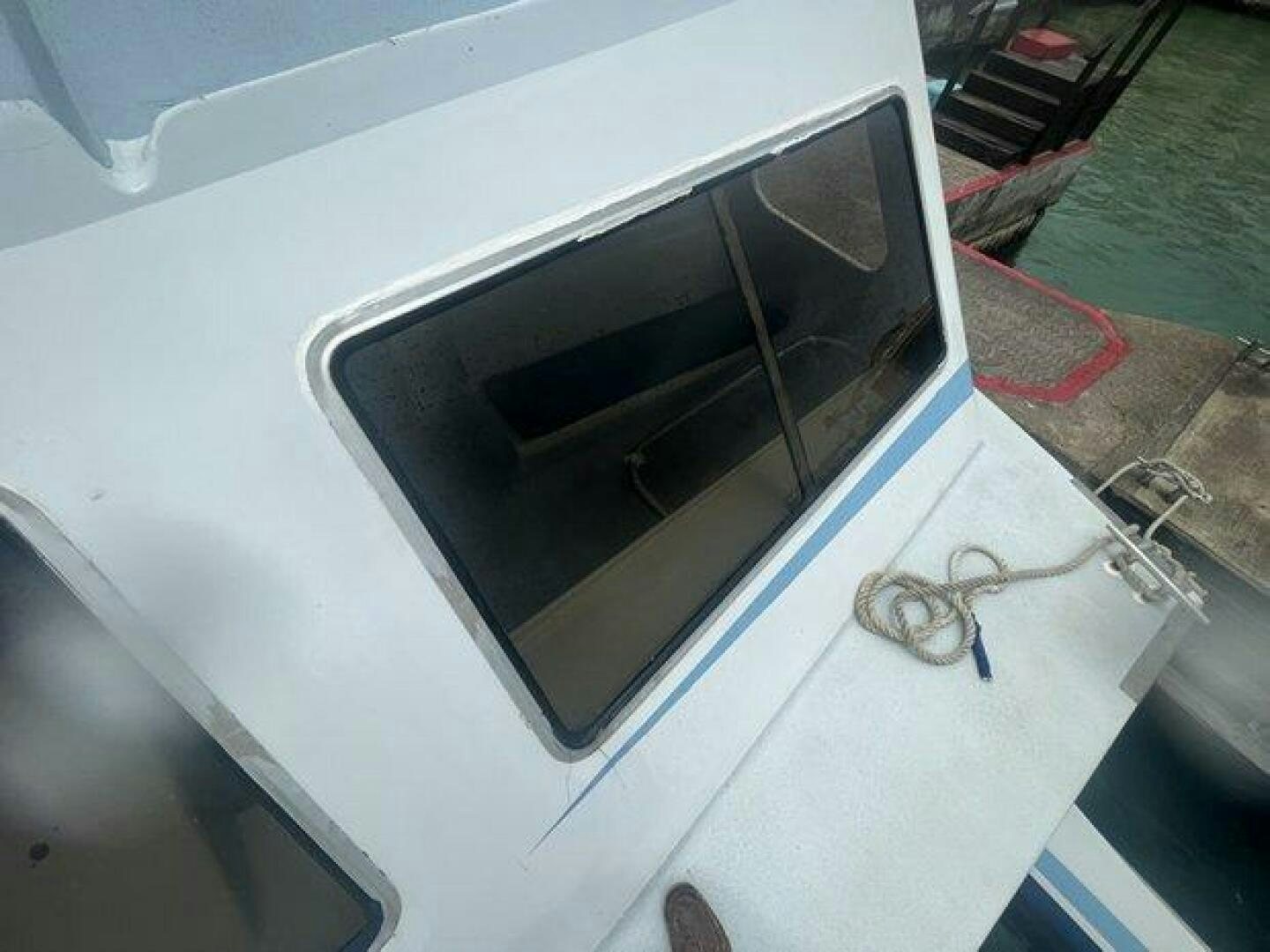 a broken television on a table aboard EDGE 2 Yacht for Sale