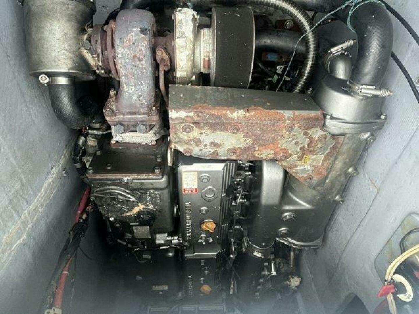 a car engine with a red and black engine aboard EDGE 2 Yacht for Sale