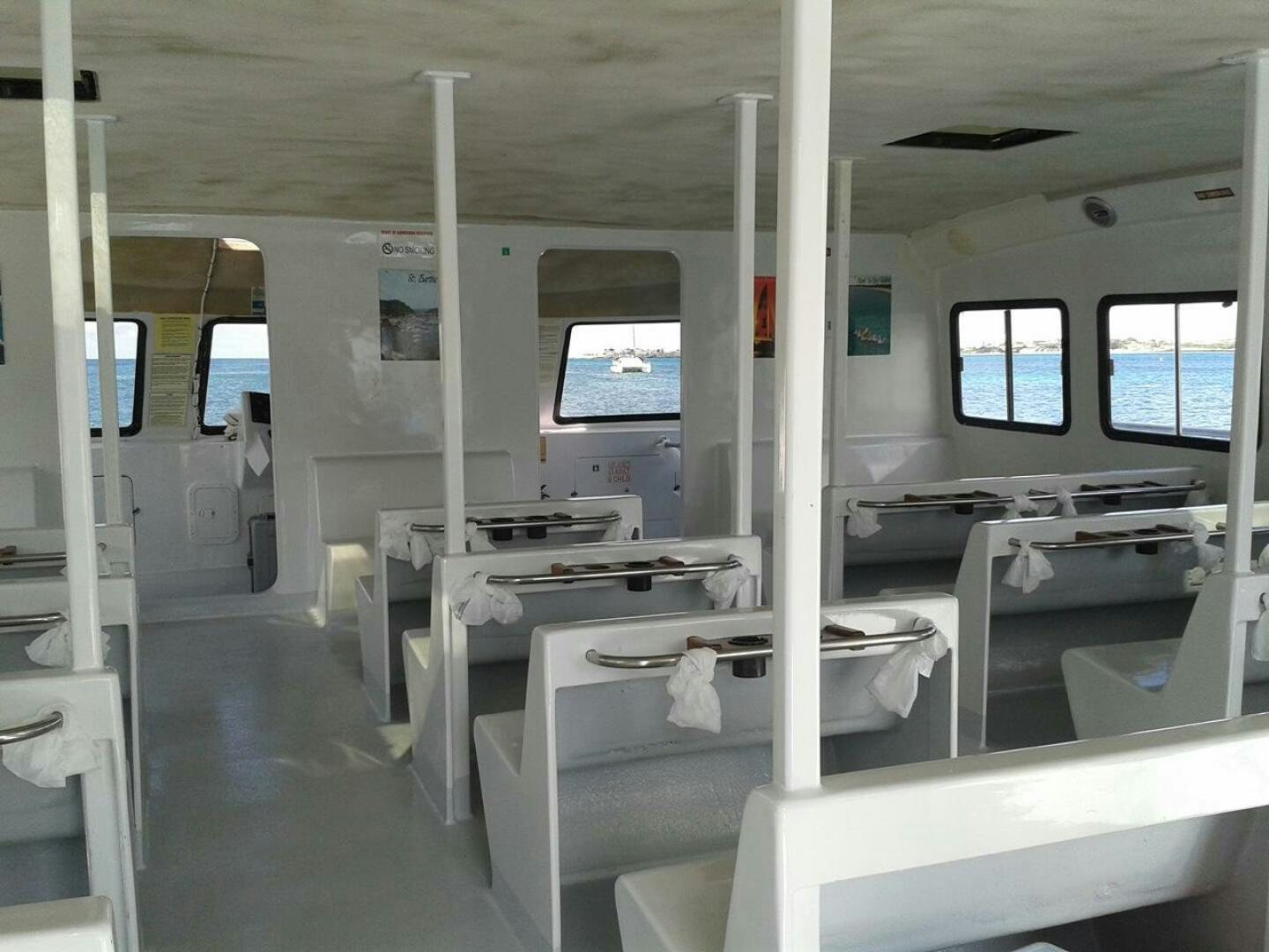 a room with many desks and computers aboard EDGE 2 Yacht for Sale