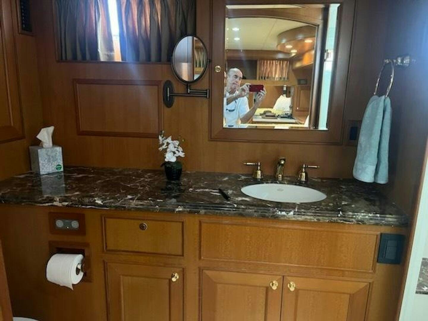 a bathroom with a large mirror aboard MOODY BLUE Yacht for Sale