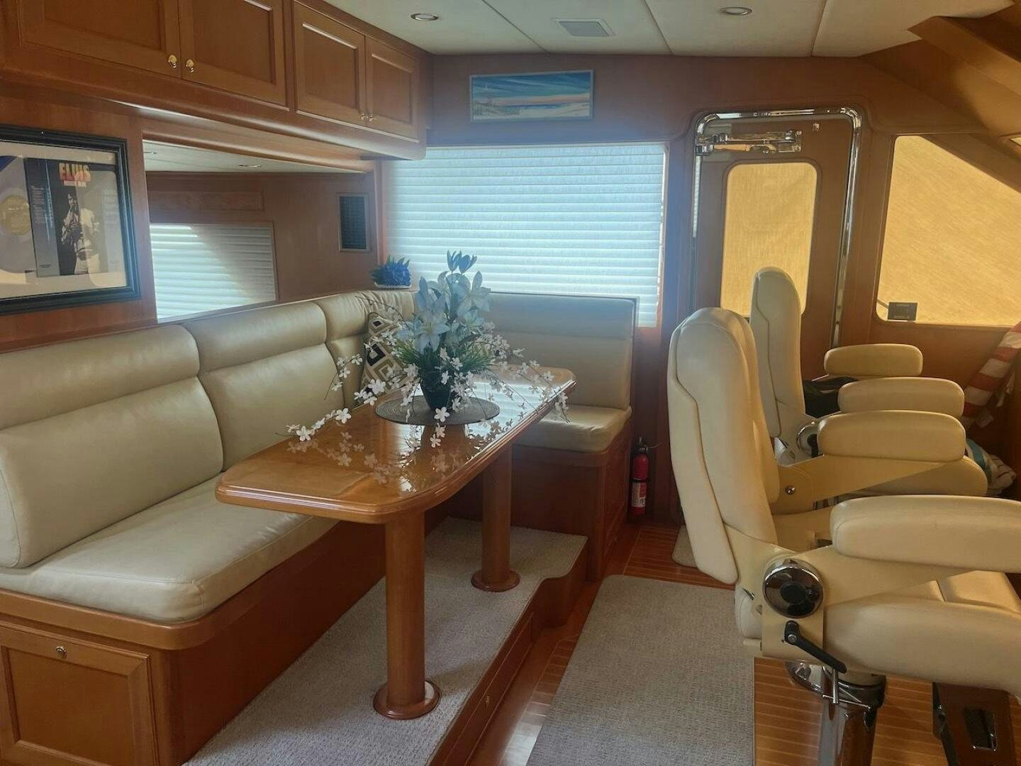 a living room with a couch and a coffee table aboard MOODY BLUE Yacht for Sale