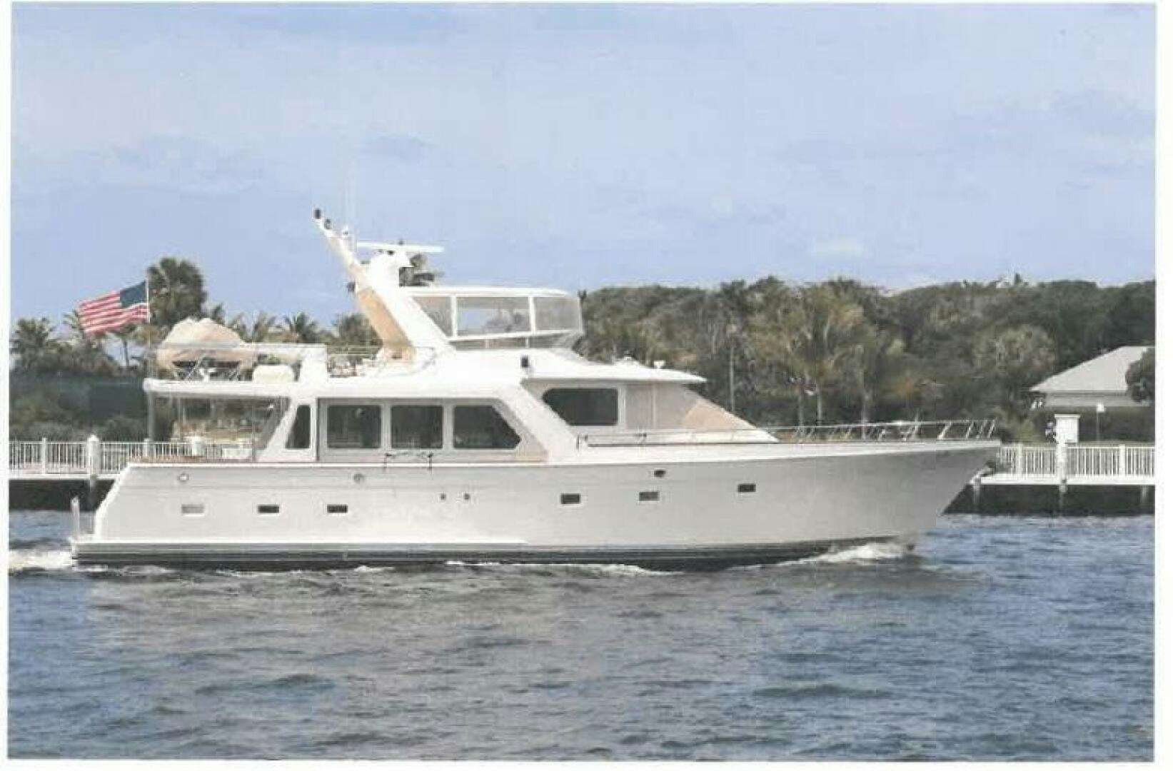 a large white boat in the water aboard MOODY BLUE Yacht for Sale