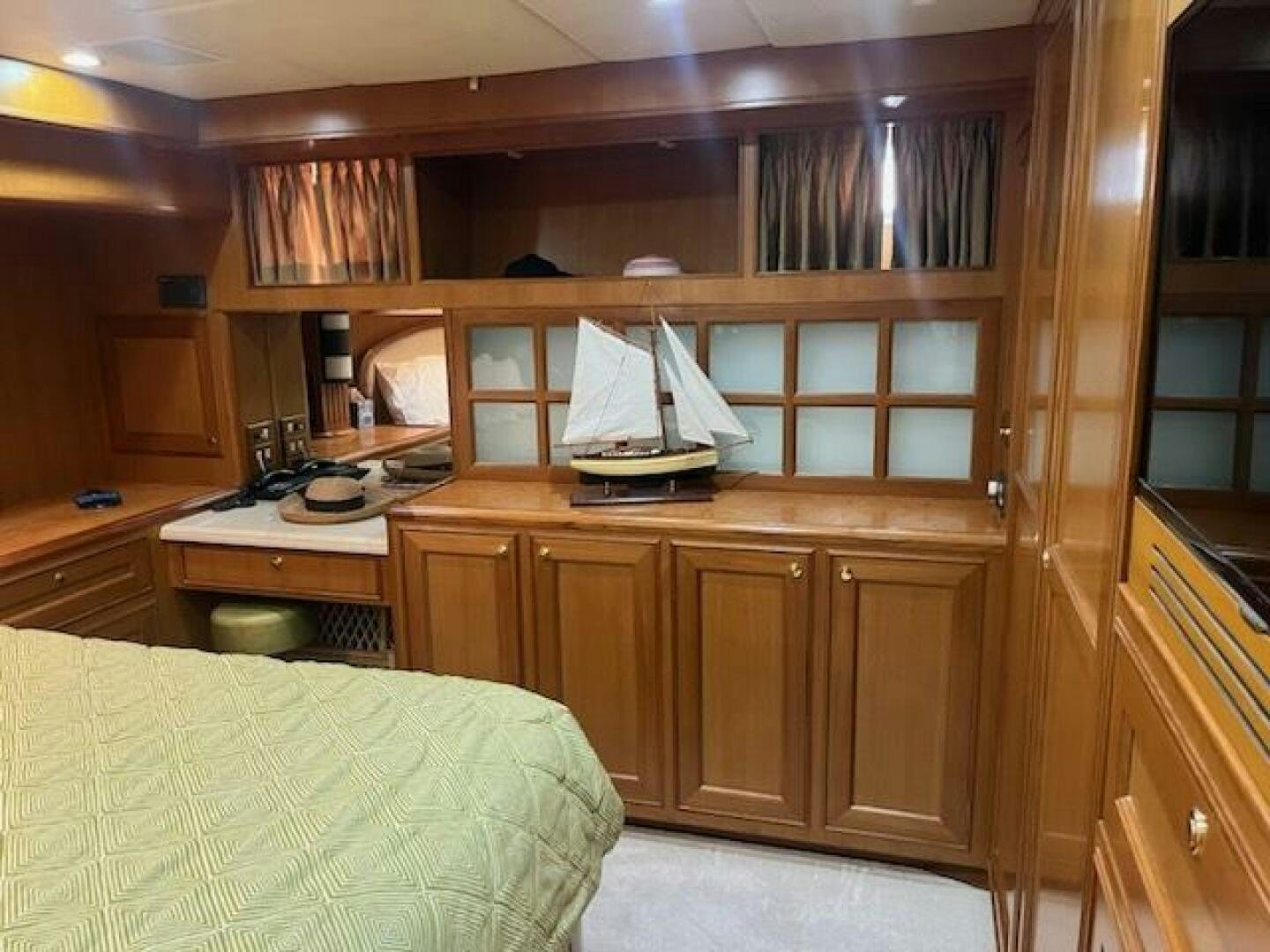 a bedroom with a bed aboard MOODY BLUE Yacht for Sale