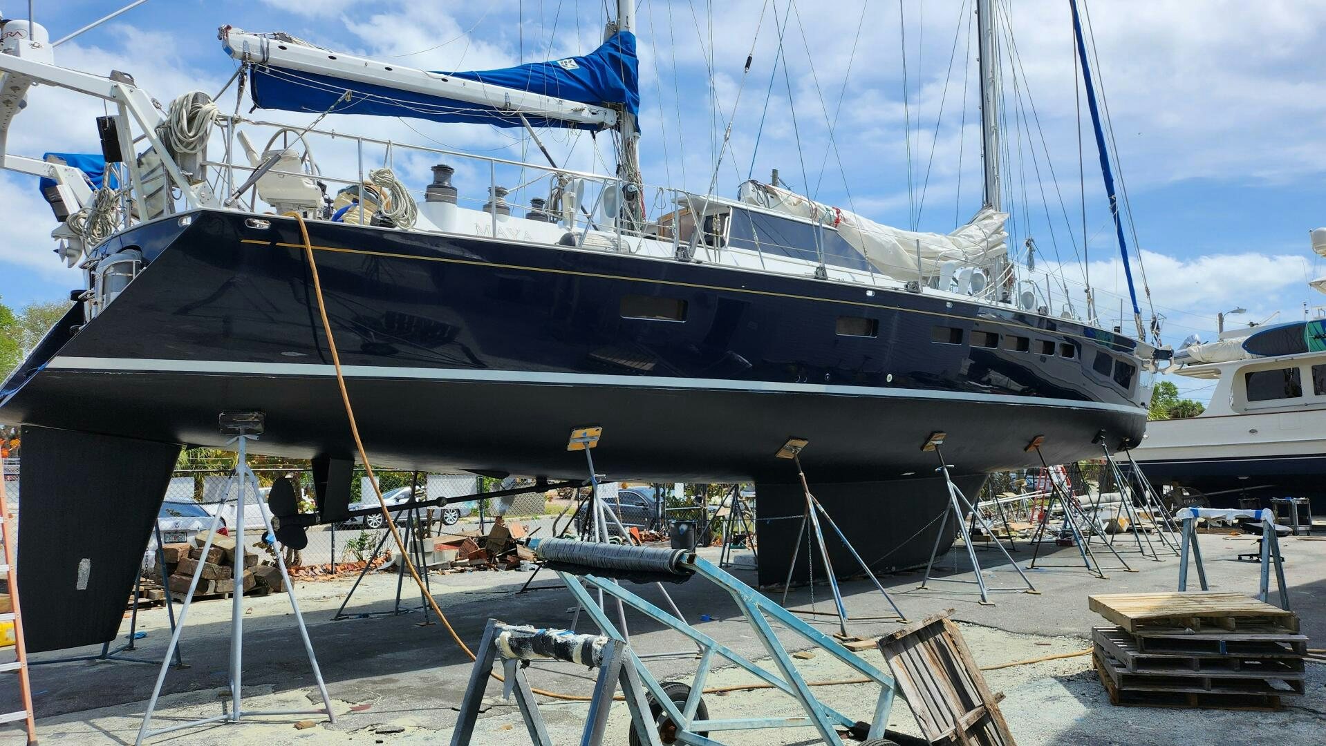 a boat docked at a pier aboard MAYA Yacht for Sale