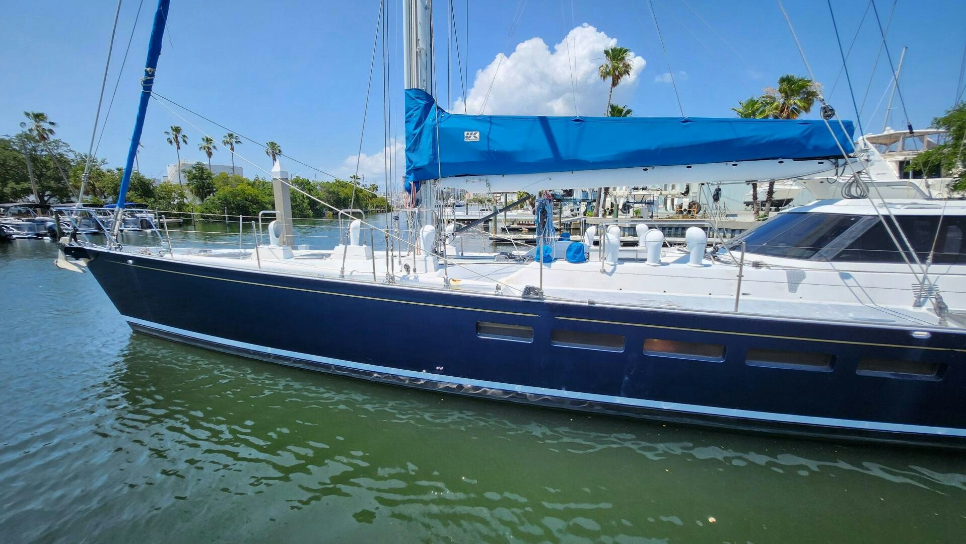 a boat docked at a pier aboard MAYA Yacht for Sale