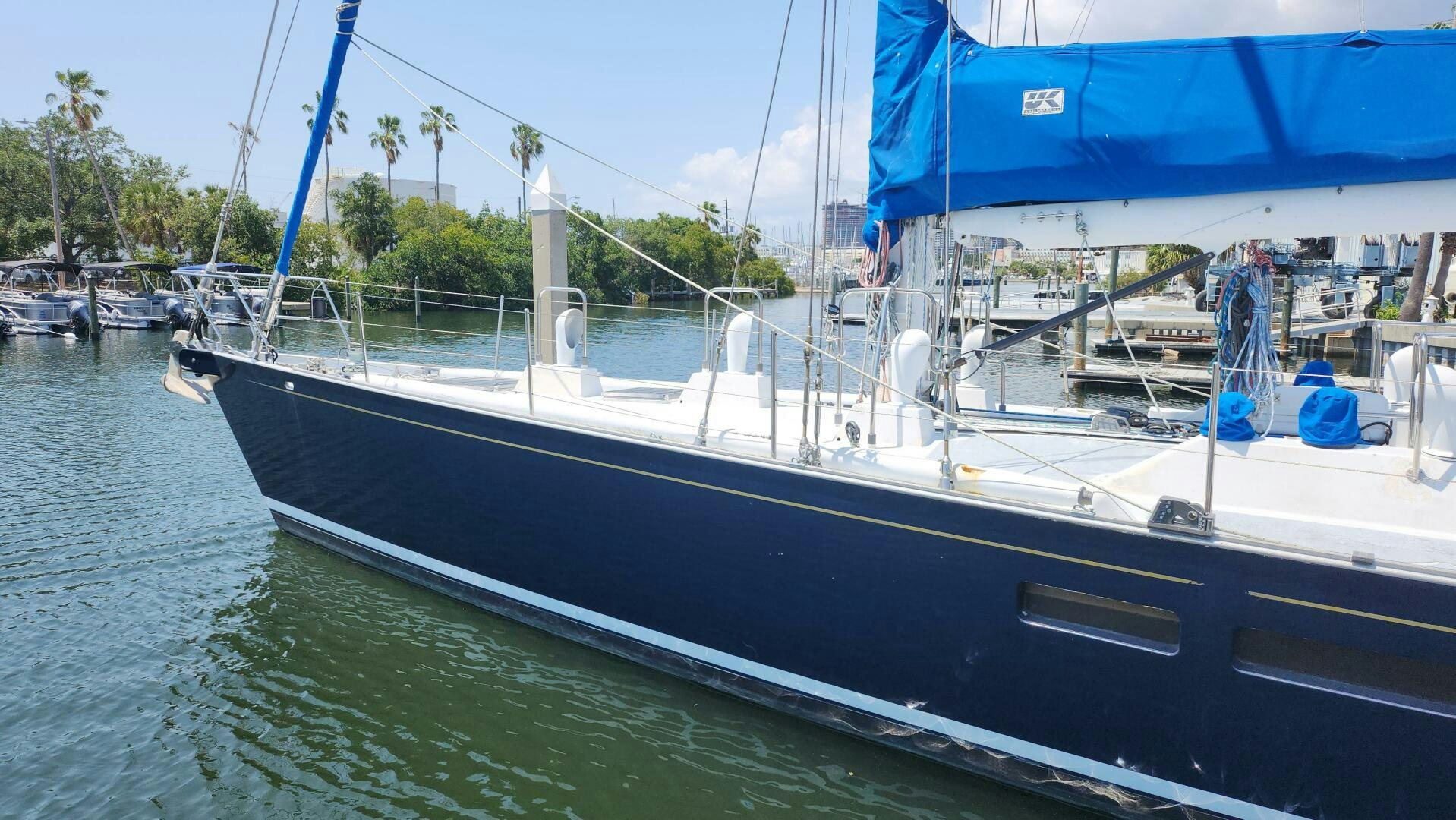 a boat docked at a pier aboard MAYA Yacht for Sale