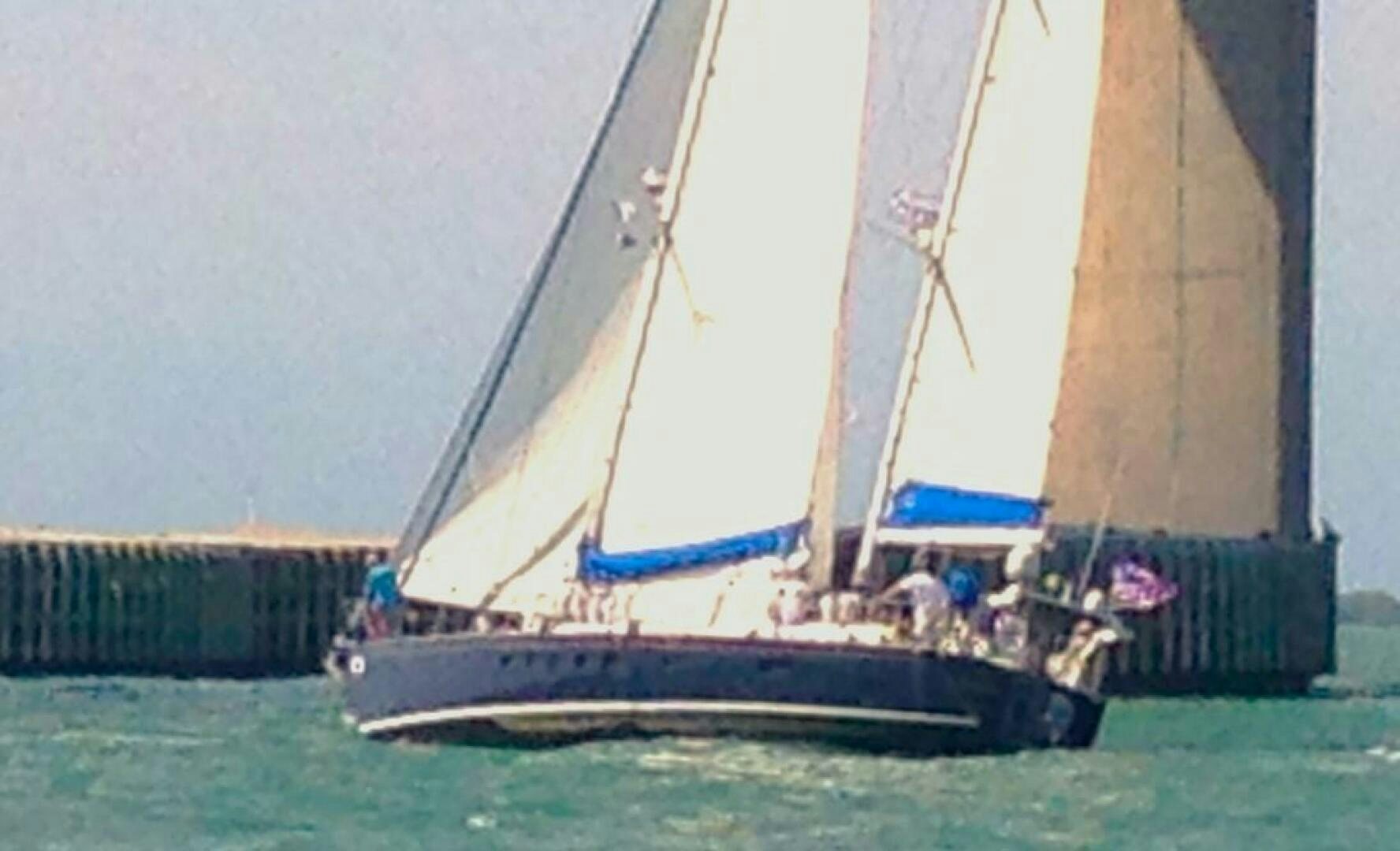 a boat with sails on the water aboard MAYA Yacht for Sale