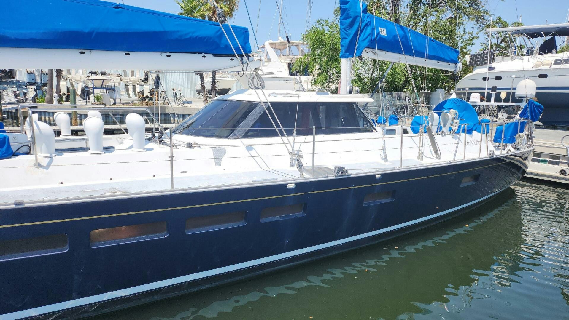 a boat docked at a pier aboard MAYA Yacht for Sale
