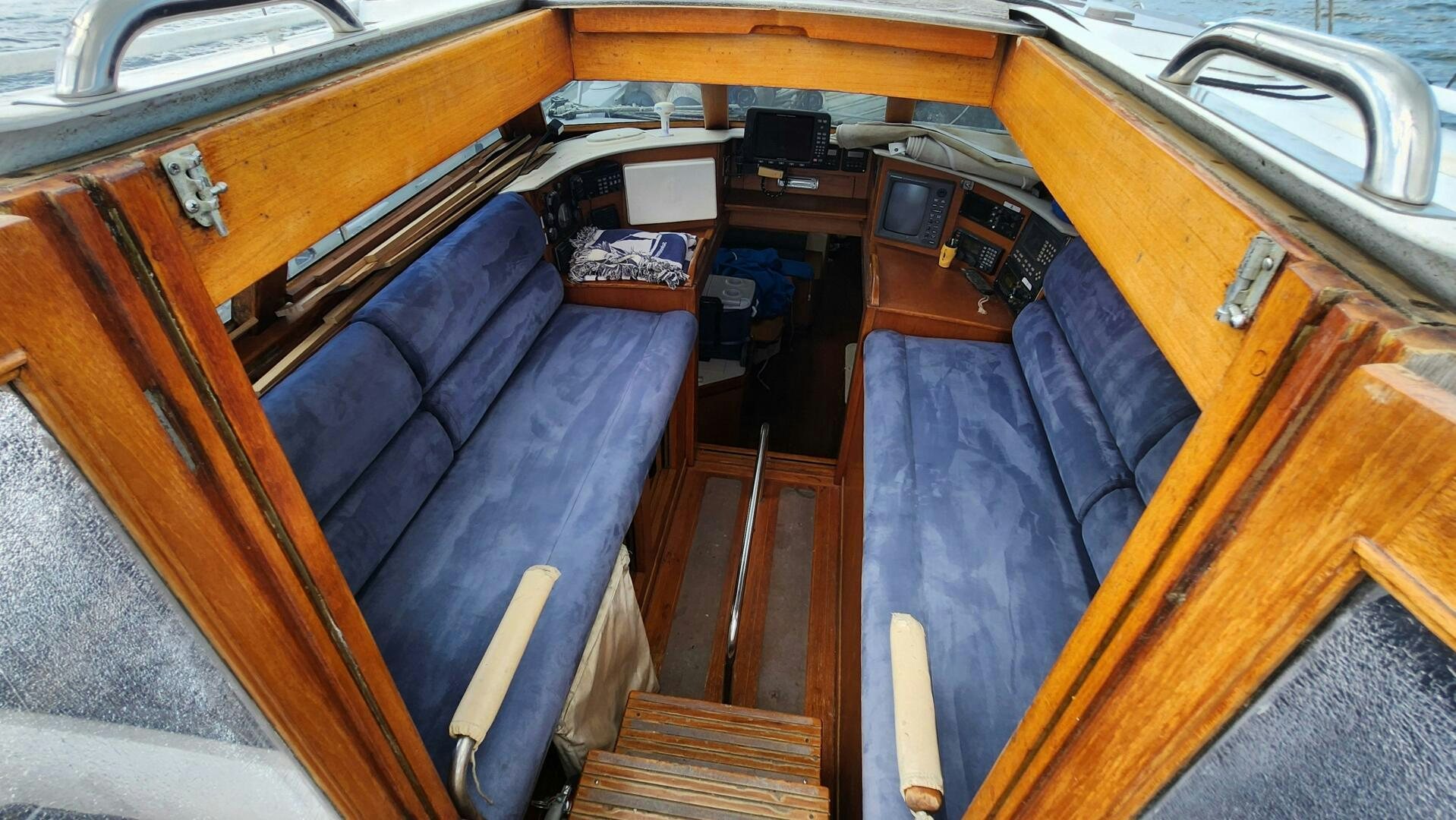 a wooden boat with wooden surfaces aboard MAYA Yacht for Sale