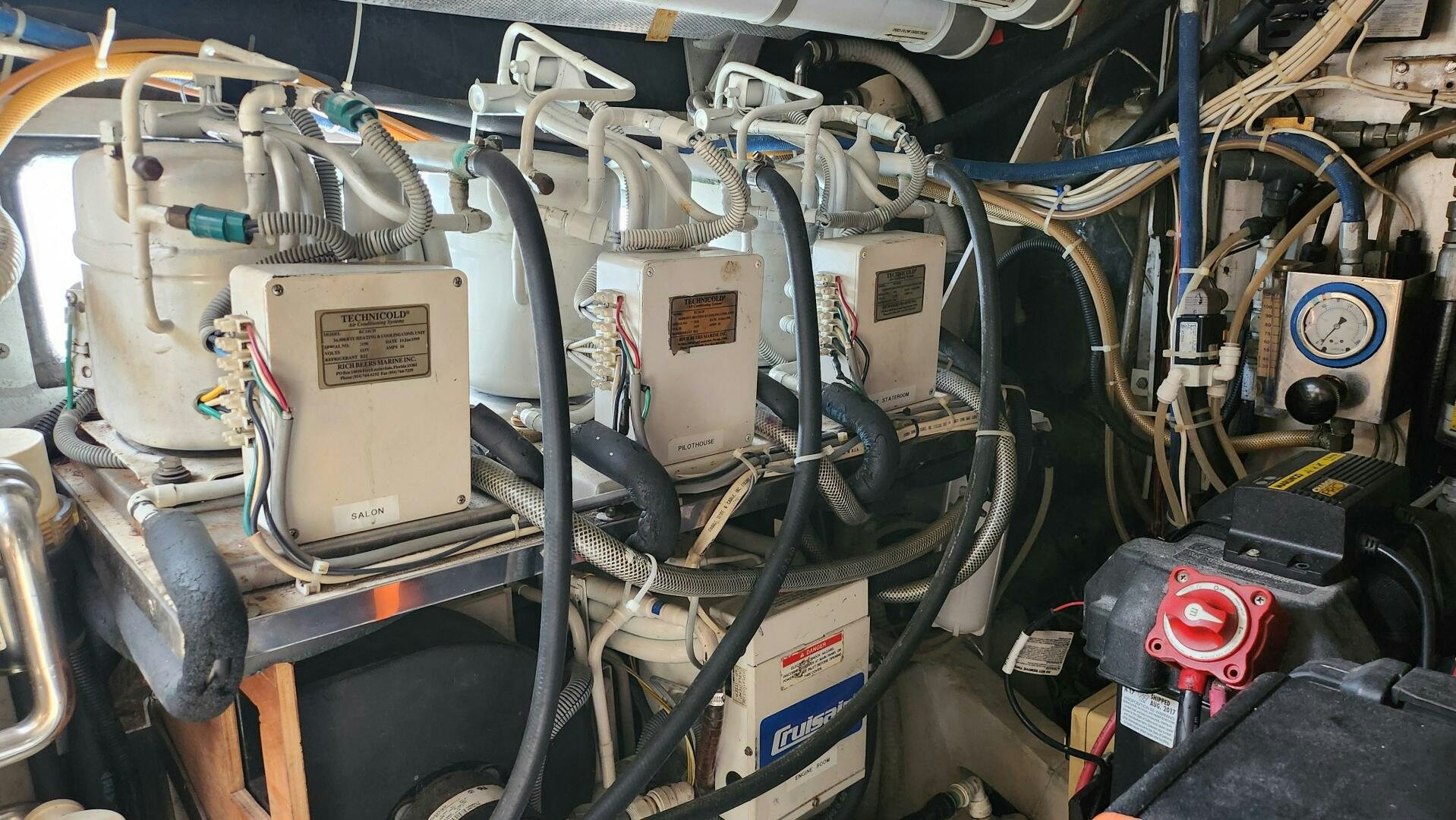 a car engine with a few parts aboard MAYA Yacht for Sale