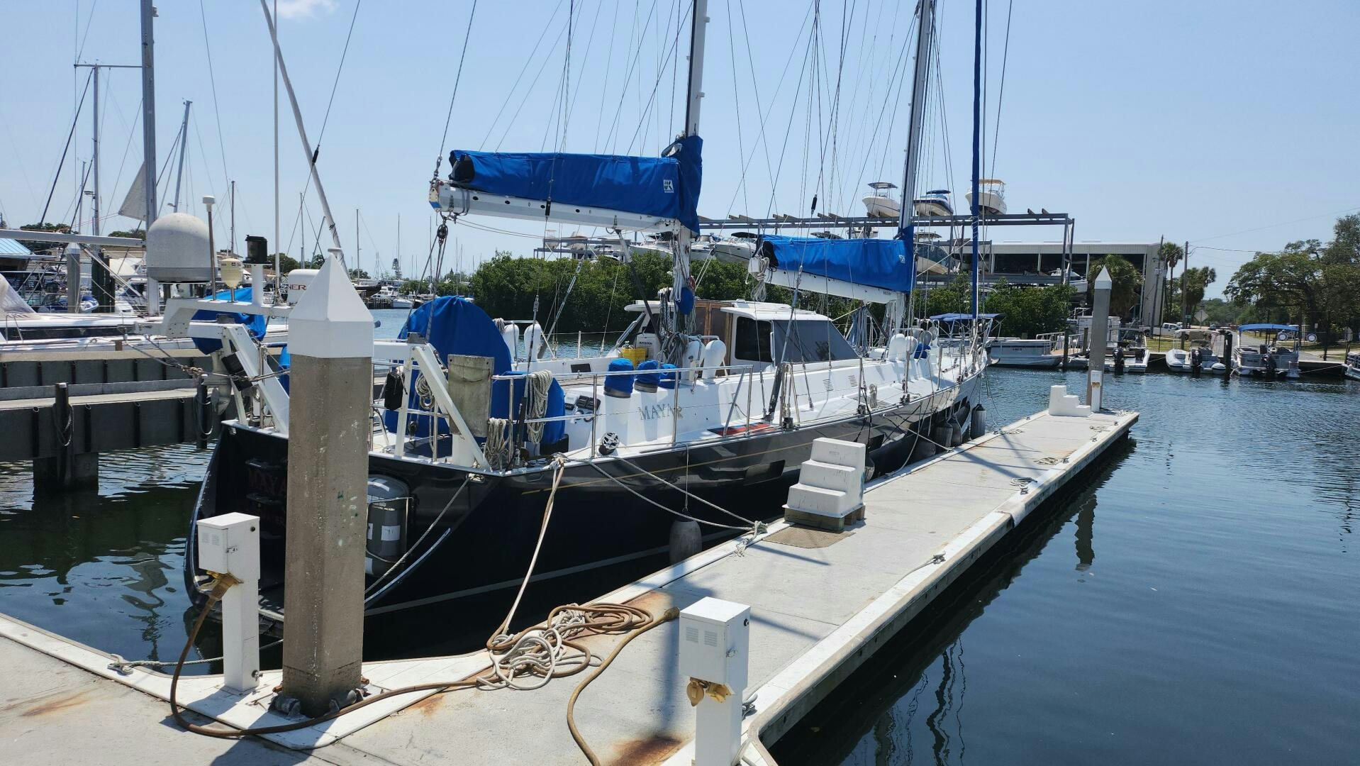 a marina with boats aboard MAYA Yacht for Sale