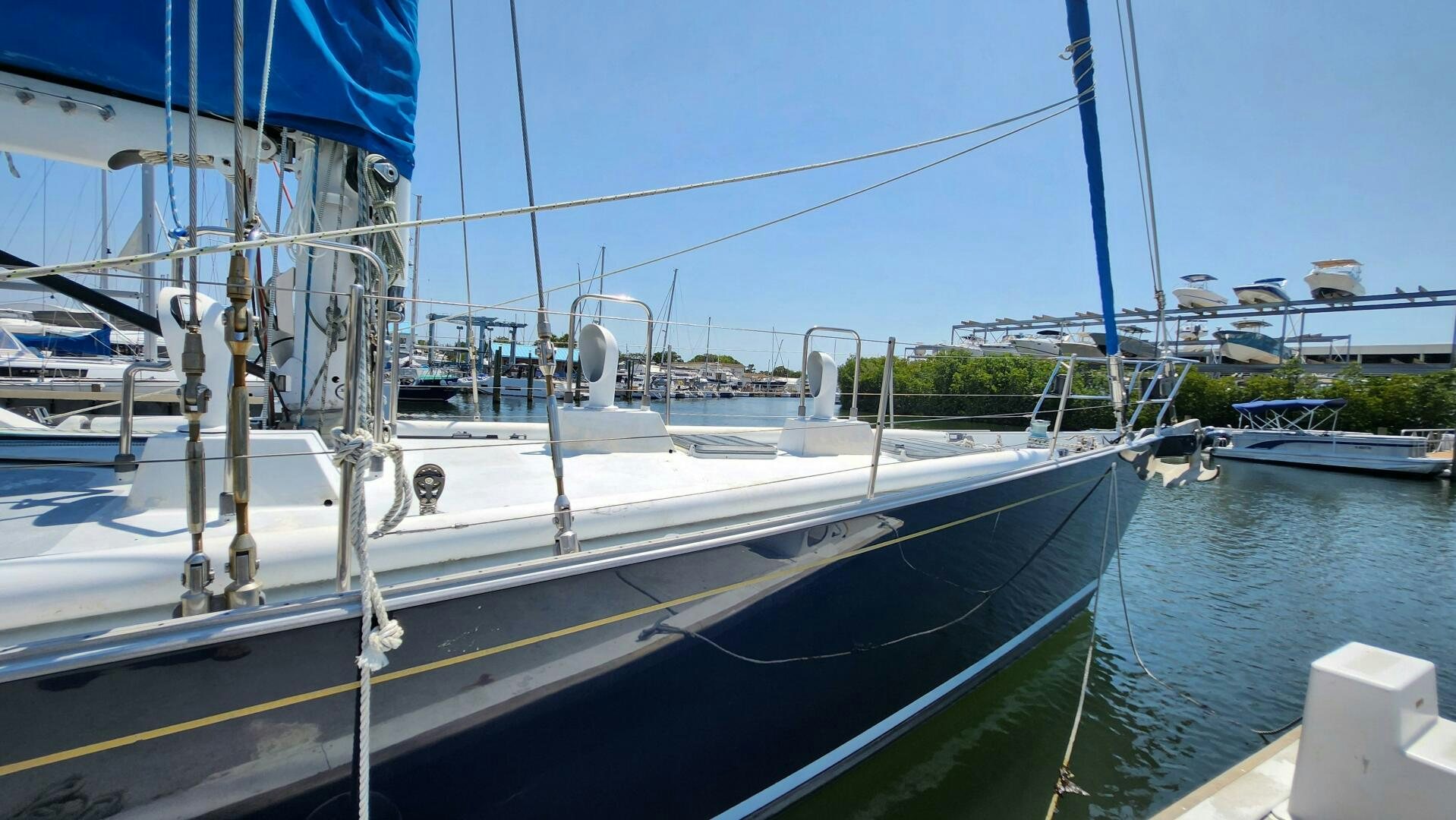 a boat docked at a pier aboard MAYA Yacht for Sale