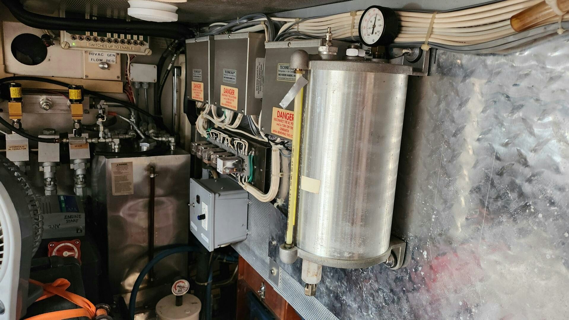 a large machine in a room aboard MAYA Yacht for Sale