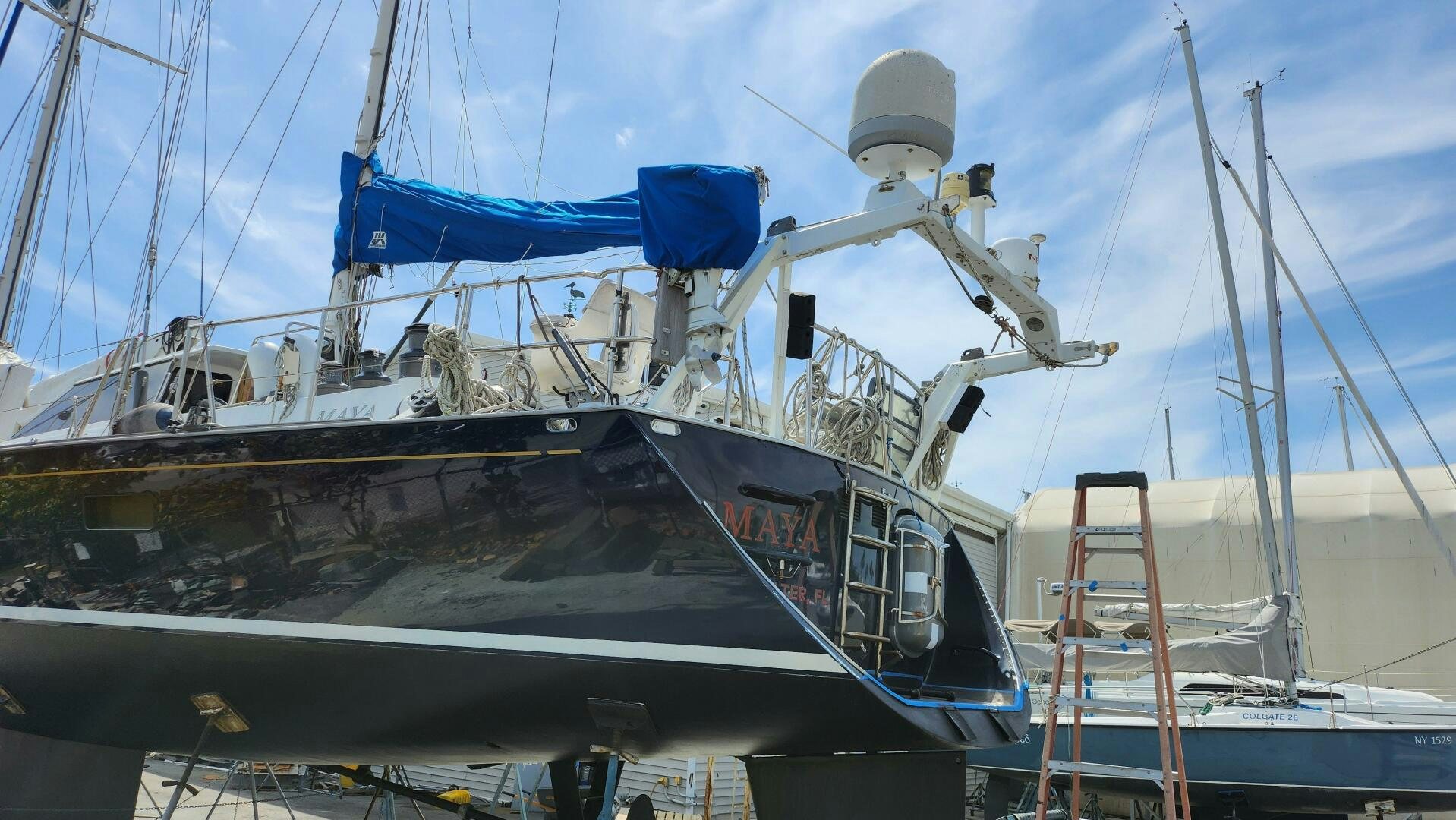 a boat docked at a pier aboard MAYA Yacht for Sale