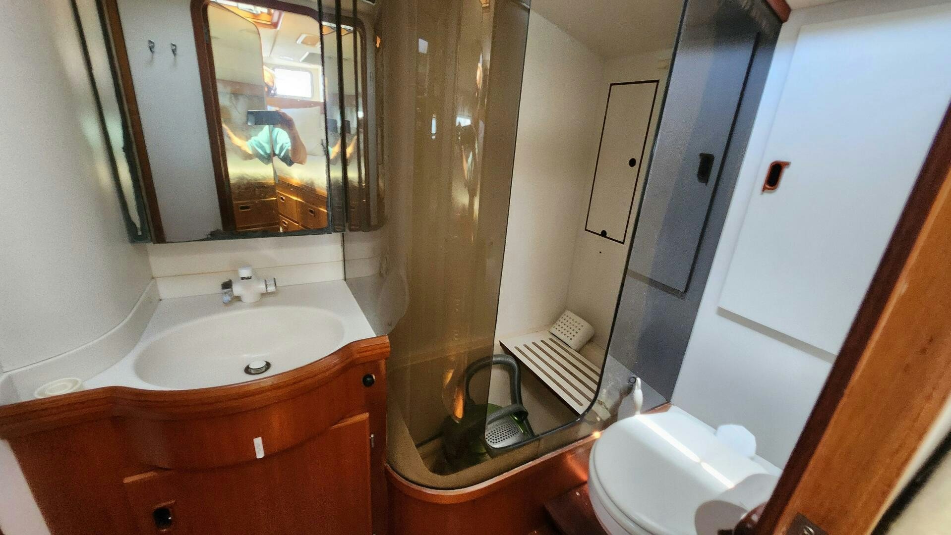 a bathroom with a sink and a toilet aboard MAYA Yacht for Sale