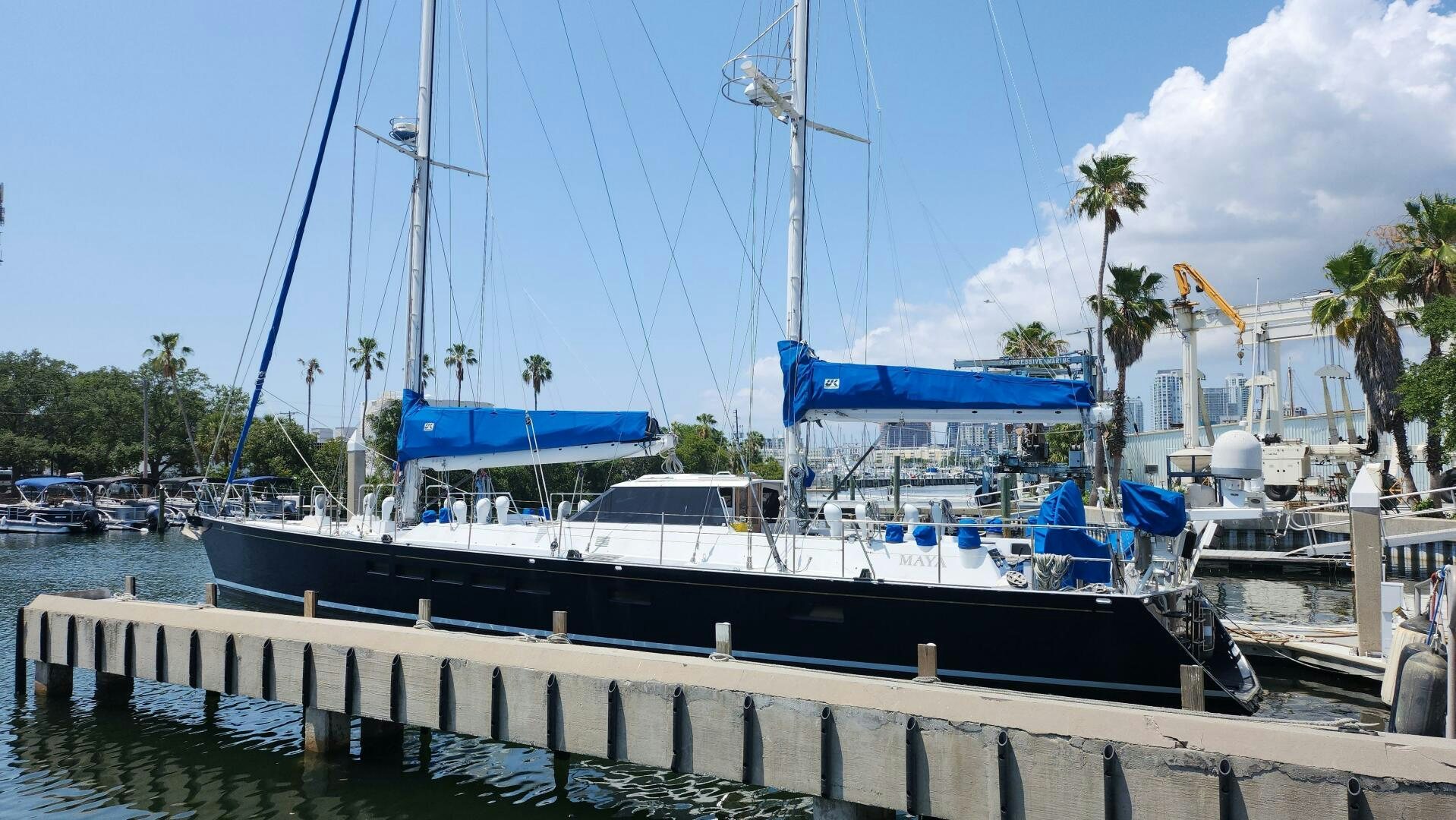 a boat docked at a pier aboard MAYA Yacht for Sale